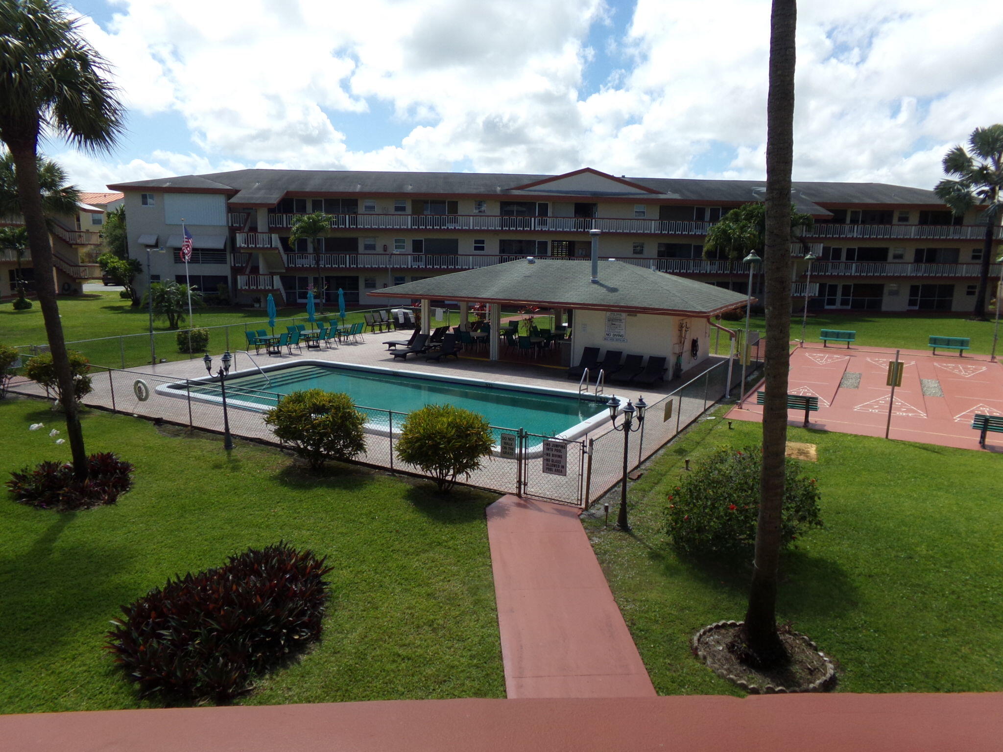 This charming 1-bedroom, 1-bathroom condo offers a bright and spacious living area filled with natural light, a comfortable primary bedroom with ample closet space, a beautifully remodeled bathroom, and a fully equipped kitchen with plenty of storage. Enjoy peaceful pool and garden views from your private screened balcony, along with access to a wide range of community amenities including a heated pool, fitness center, clubhouse, library, game room, social areas, BBQ facilities, bocce and shuffleboard courts, a courtesy bus, secure parking, gated access, and abundant guest parking—all within a vibrant 55+ community designed for comfort, convenience, and an active lifestyle. 20% down payment required, 640 credit score minimum, 45K income requirement, 12 months of dues to be held in escrow for 36 months.