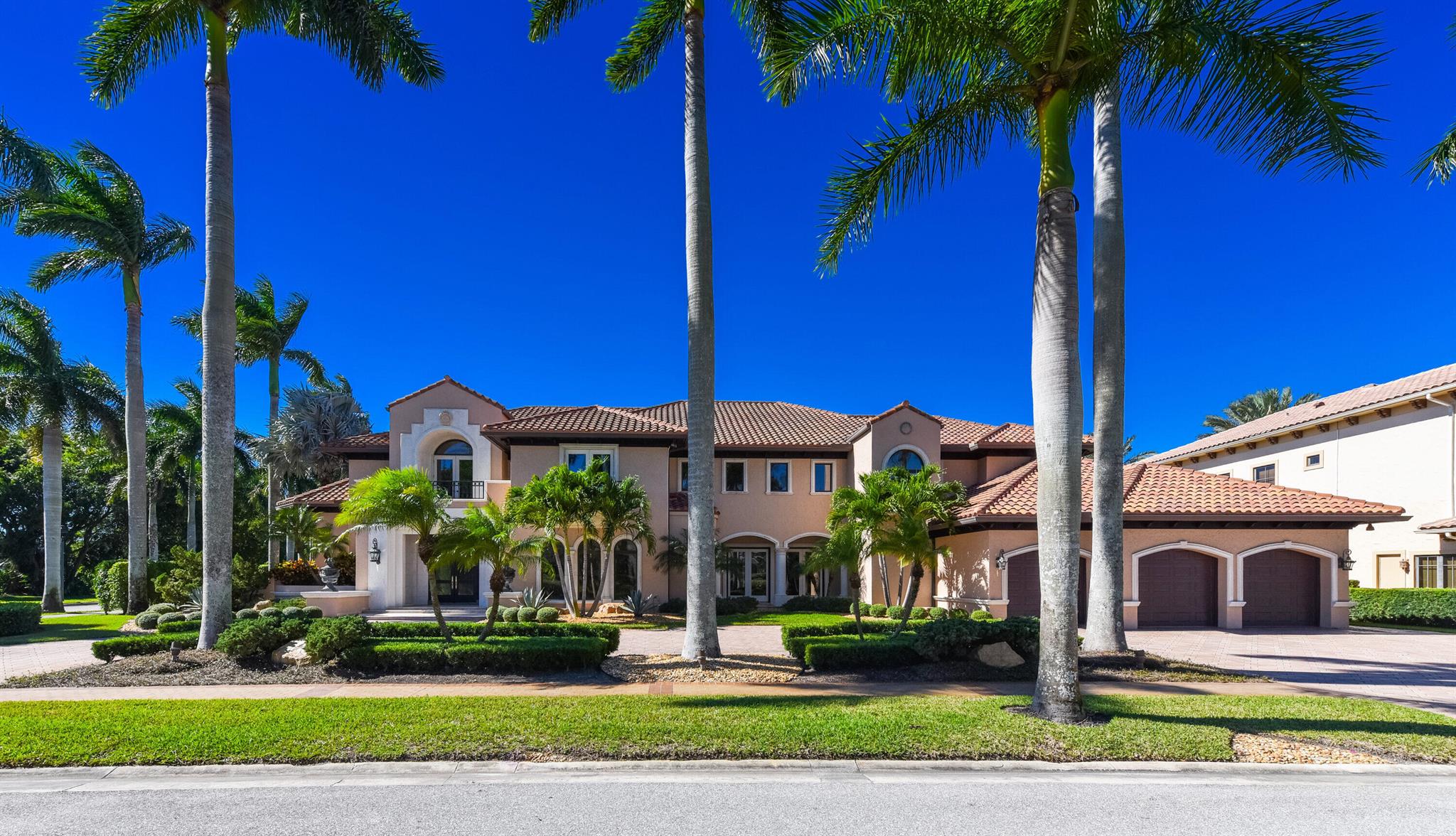 Custom Palm Beach inspired two story, 5 bedroom estate with office & library situated on over a half acre home site overlooking panoramic double lake and fairway views. The dramatic first level contains an incredible primary suite complete with fireplace, 2 oversized custom fitted closets and separate and private luxurious bathrooms. A gorgeous, fully paneled office and large ensuite guest bedroom/home theater complete the first floor. The second level has three oversized ensuite guest bedrooms all with balconies & a library/study area for the family/guests. The patio is complimented by generous covered areas & a large pool & spa all overlooking the breathtaking lakes and fairways of St Andrews Country Club. Large circular driveway, 3 1/2 car garage & a 2016 roof complete this estate. The information herein is deemed reliable and subject to errors, omissions and changes without notice. All measurements are approximate.