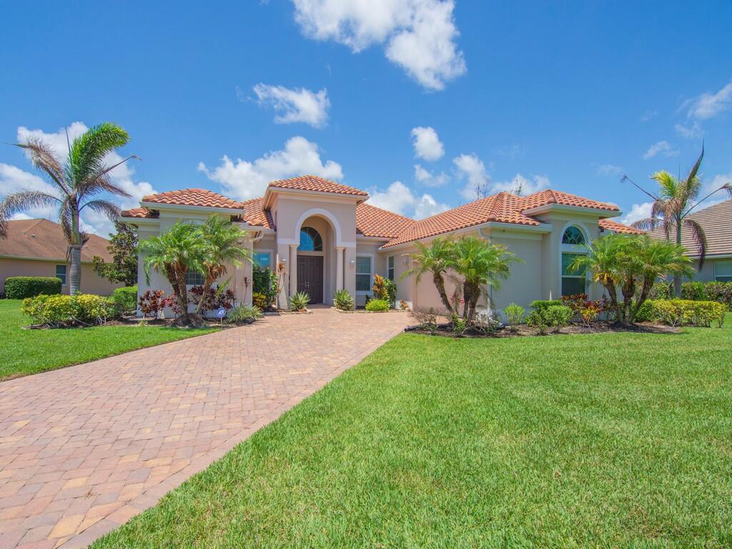 Spacious and award-winning GHO Sawgrass floor plan offering nearly 3,000 SF under air with 3BR + den, 3BA, and a true split-bedroom design for privacy. The open-concept great room flows seamlessly into an oversized chef's kitchen featuring a massive island, café dining area, and formal dining room. Luxurious owner's suite with dual walk-in closets and spa-style bath. Enjoy Florida living with a large covered lanai, impact glass, concrete tile roof, and premium estate-level finishes throughout.