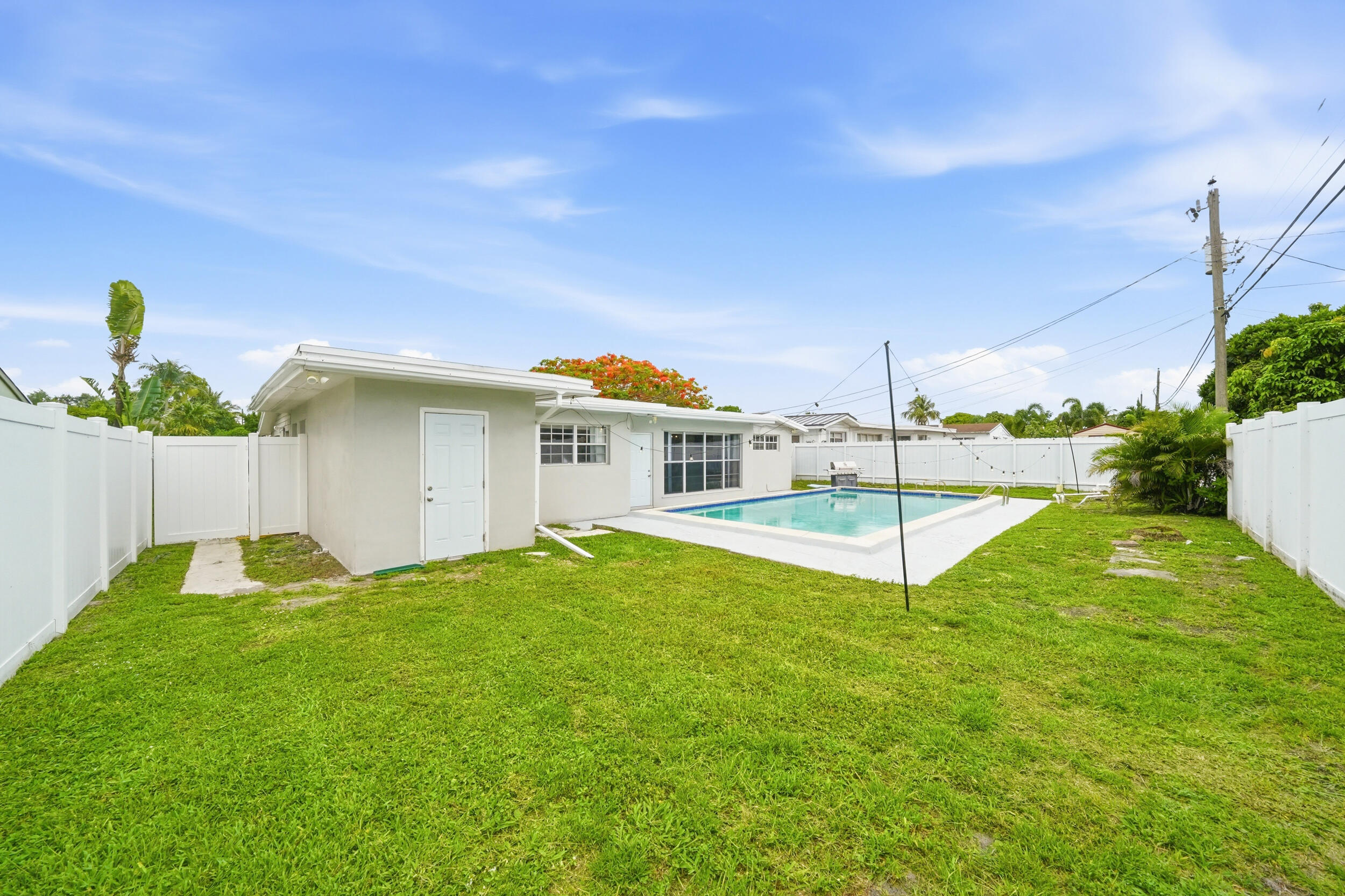 POOL HOME + NO HOA! Welcome to this beautifully maintained 4-bedroom, 2-bath home featuring a private pool, fully fenced backyard, and flexible floor plan designed for functional living. Recent updates include a 2017 roof, 2020 fence, and newer tile flooring throughout. Natural light pours through oversized windows, creating a bright and inviting atmosphere. The extra 4th bedroom offers the perfect space for guests, a home office, while the walk-in laundry room and attached walk-in storage room provide exceptional functionality. Enjoy Florida living year-round from your private backyard oasis with plenty of room to relax and entertain. Conveniently located near the Hard Rock Hotel & Casino, shopping, dining, major highways, and just 5 miles from the beach. Move-in Ready & no restrictions!