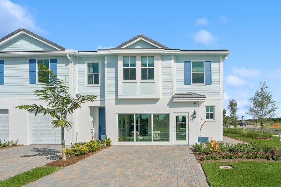 Welcome home to the beautifully designed Fullerton II townhome at Salerno Reserve, currently under construction and anticipated for September 2026 completion. Combining timeless farmhouse style with one of the community's most desirable water-view homesites, this home offers the perfect balance of comfort, elegance, and low-maintenance living.  Inspired by the warmth and charm of the professionally decorated model home, this residence features our sought-after Farmhouse design collection with rich brown cabinetry, designer-selected finishes, and matte black fixtures throughout. The thoughtfully designed kitchen serves as the centerpiece of the home, offering abundant storage, generous counter space, and an open-concept layout that flows effortlessly into the dining and living areas.   Located within Building 5, this exceptional homesite enjoys expansive water views that create a peaceful and picturesque backdrop. From the primary suite windows, you'll wake up to beautiful views across the community water feature, adding a sense of openness and tranquility that makes this home truly special.  The popular Fullerton II floor plan is designed for today's lifestyle, offering spacious living areas, modern functionality, and the peace of mind that comes with owning a brand-new construction home. Every detail has been carefully selected to create the warm, inviting feel that buyers love while maximizing the beauty of this unique homesite.  Located within the gated community of Salerno Reserve, residents enjoy resort-style amenities including a community pool, pickleball courts, and walking trails, all conveniently located near Downtown Stuart, beaches, shopping, dining, and I-95.  This is a rare opportunity to own a designer-inspired home featuring warm farmhouse finishes and expansive water views in one of Stuart's most sought-after new home communities.