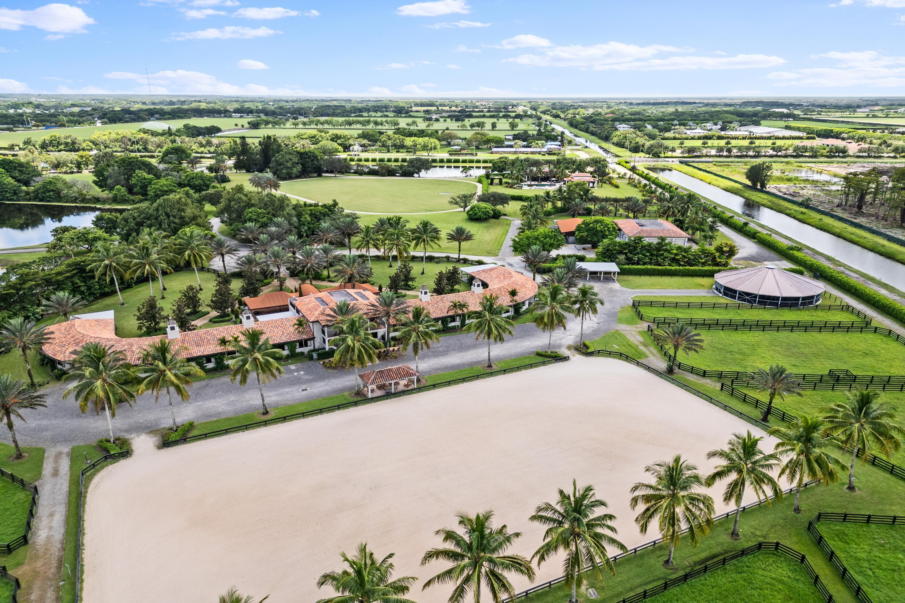 36 Stalls Private Farm available for rent during 2027 WEF Season. 20 acre equestrian estate in a prime location! Directly on bridle path, less than 1/4 mile hack  to NEW Wellington International show grounds. This Farm is fully gated and has 2 barns, beautiful lounges, office space, living quarters & dining areas. The main barn (20) with two wings of 10 stalls each, tack room & storage room for each side, rubber pavers aisle. In addition to the main barn, an annex barn with 16 stalls, for a total of 36 stalls on site. Brand new 150' x 250' Wordley & Martin arena , 15 oversized grass paddocks, and an oversized Derby field with sand Bridle Path around, 8 Horse Covered Walker.