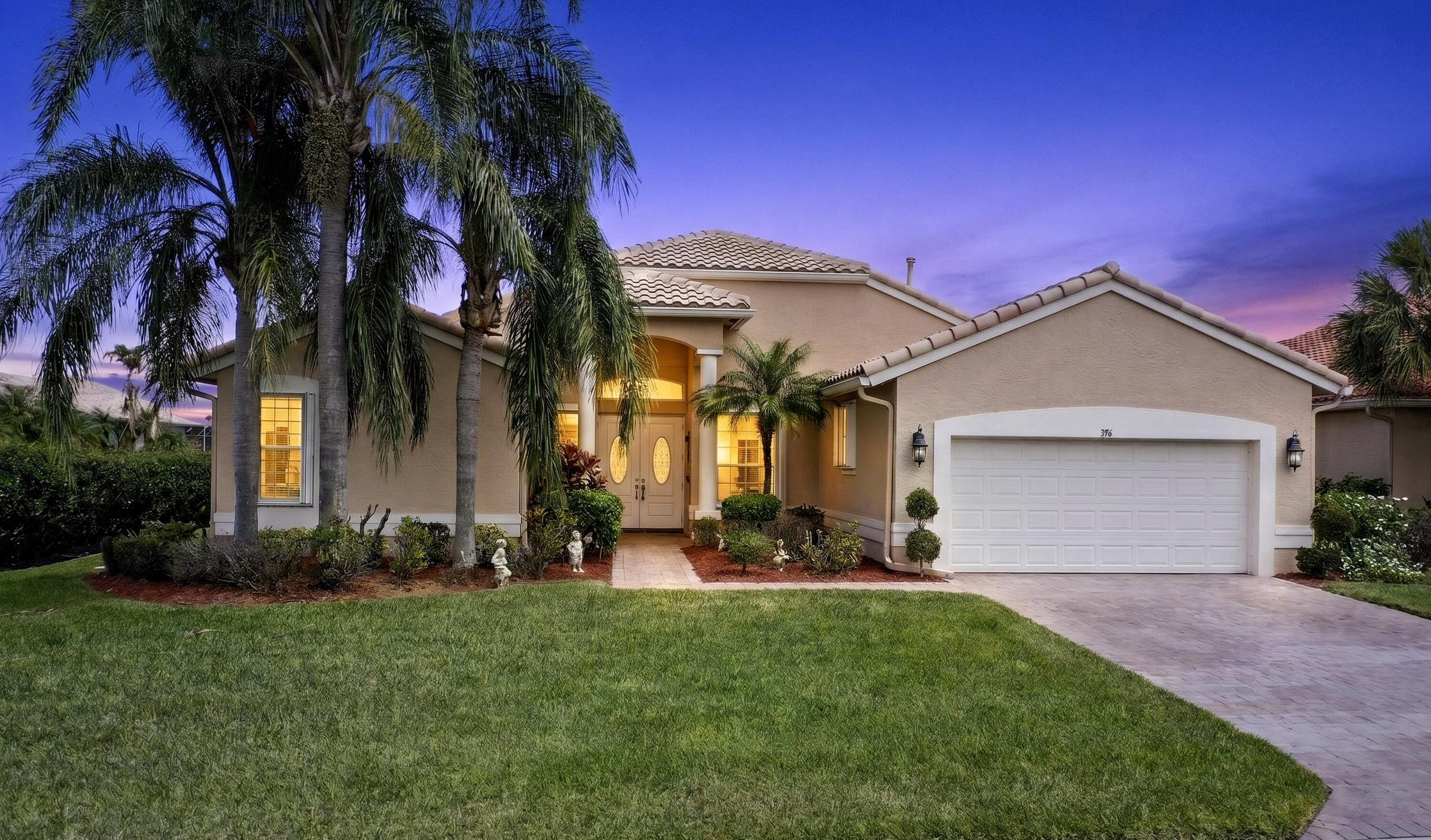 Welcome to this beautifully maintained home in the sought-after Cascades at St. Lucie West, a premier gated community offering resort-style amenities including a clubhouse, pool, fitness center, tennis, pickleball, and more. This residence features an oversized screened patio perfect for entertaining—overlooking expansive lake views that create a peaceful, private setting. Inside, enjoy a bright, open layout with a well-appointed kitchen offering ample cabinetry and counter space, seamlessly flowing into the living areas. Experience comfort, tranquility, and an active lifestyle all in one. A must see!