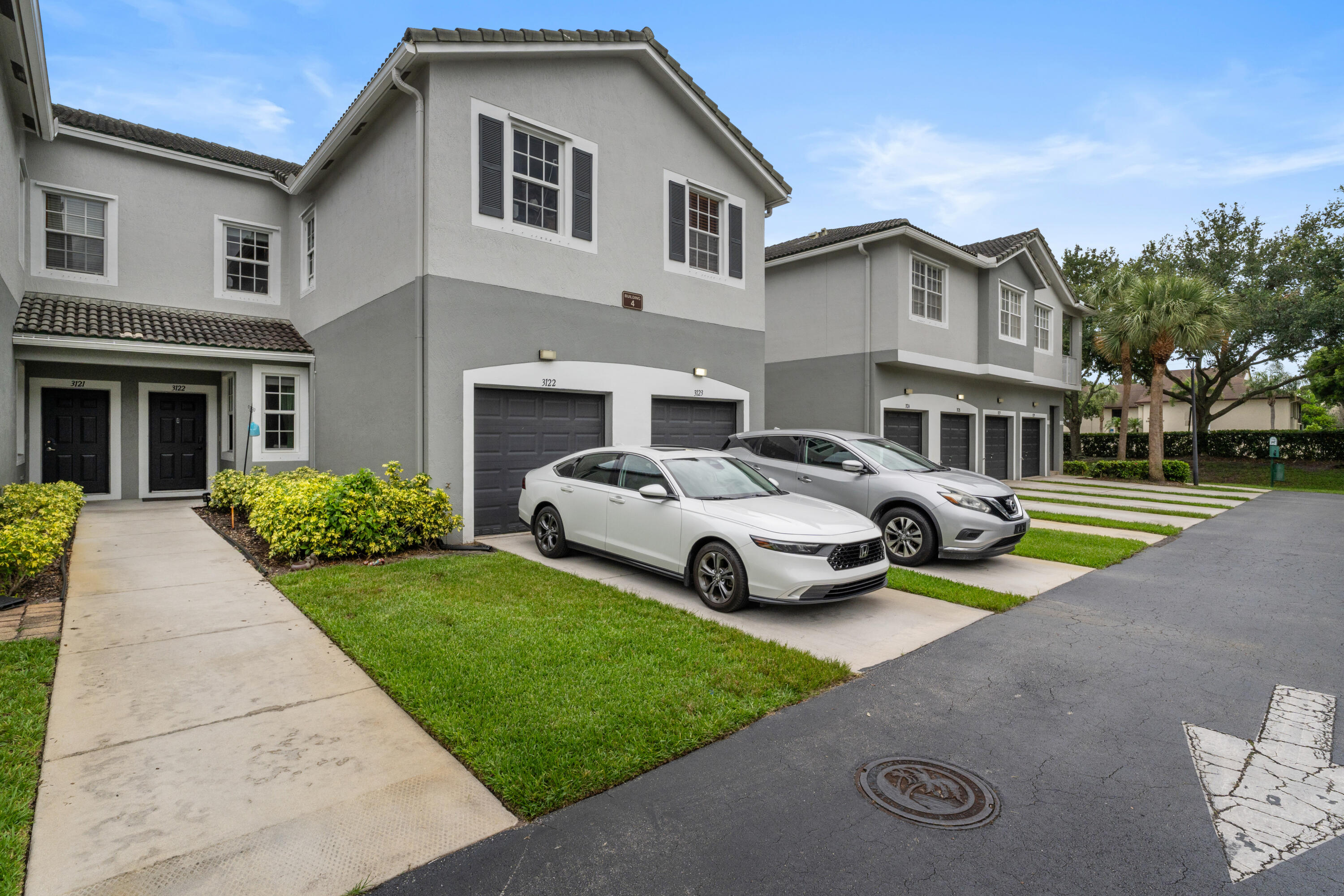Welcome to Magnolia Bay! This is one of the largest and most desirable floor plans currently available in the community. Offering incredible flexibility, this spacious layout can easily be configured as a 4-bedroom home, a private office, a den, or any combination that fits your lifestyle.  This beautifully maintained townhouse-style condominium features full impact windows, an attached garage, and a thoughtfully designed floor plan with endless possibilities. Located in a prime area, you'll enjoy convenient access to top-rated schools, shopping centers, restaurants, and some of the area's most beautiful natural parks.  Even better, this property may be purchased with as little as 3% down, and the community qualifies for FHA financing, making homeownership more accessible than ever.
