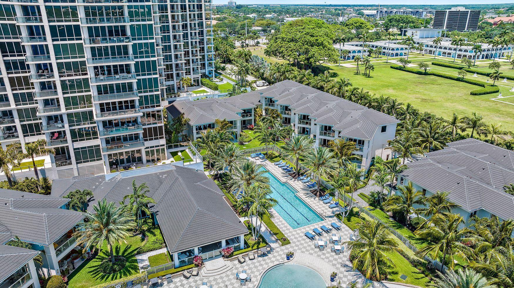 This luxurious three story Water Club townhouse features stunning views and the opportunity to live in a true tropical paradise. Featuring 3 bedrooms, 4 bathrooms and 4,138 total square feet, this desirable townhouse is perfect for entertaining. Notable features include an open floor plan, gourmet kitchen with large island, two private patio decks, summer kitchen, high ceilings, living areas filled with bright natural light, and private 2 car garage. The Water Club offers first-rate amenities including 24-hour front desk service, resort-style pool, lap pool, spa, elegant clubhouse, fully equipped fitness center and dedicated boat slips.