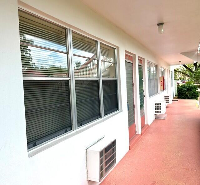 NO SMOKING BUILDING* NO PETS. BUYERS AGENTS WELCOME! First floor, turnkey, one bedroom one bathroom unit. The unit boasts tile flooring throughout, two wall unit ACs, ceiling fans, and screened-in patio with poly sliders.  The updated bathroom includes new tile, new vanity, mirrored medicine chest, step-in shower with shower seat, and security bars. Live in a resort style community with tons of amenities. Outdoor and indoor pools, shuffleboard, bocce ball, boating, pickleball, exercise room, card room and a state of the art theater .There is a community bus with stops throughout the community for shopping etc.  Gated community with manned gates.