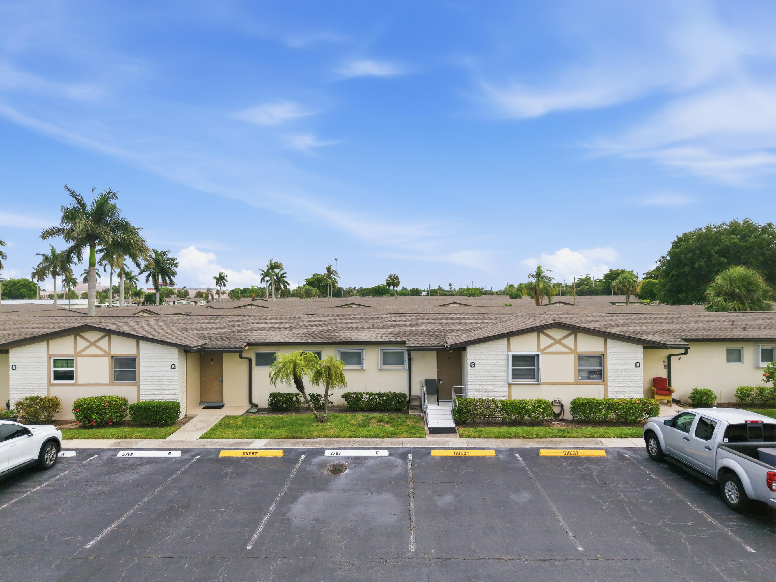 Welcome home to this beautifully maintained 1-bedroom, 1.5-bath condo offering comfort, convenience, and value in the heart of West Palm Beach. This bright and inviting home features an open living and dining area and a spacious primary bedroom with generous closet space. The kitchen is equipped with newer appliances, while the bathroom features a newer ADA-accessible walk-in shower, offering both style and functionality.   Enjoy the enclosed patio, perfect for relaxing with your morning coffee or unwinding at the end of the day. Additional highlights include a newer water heater, accordion hurricane shutters for added storm protection and a new building roof.  Located near shopping  and dining.   This move-in-ready condo offers an exceptional opportunity to enjoy the Florida lifestyle.