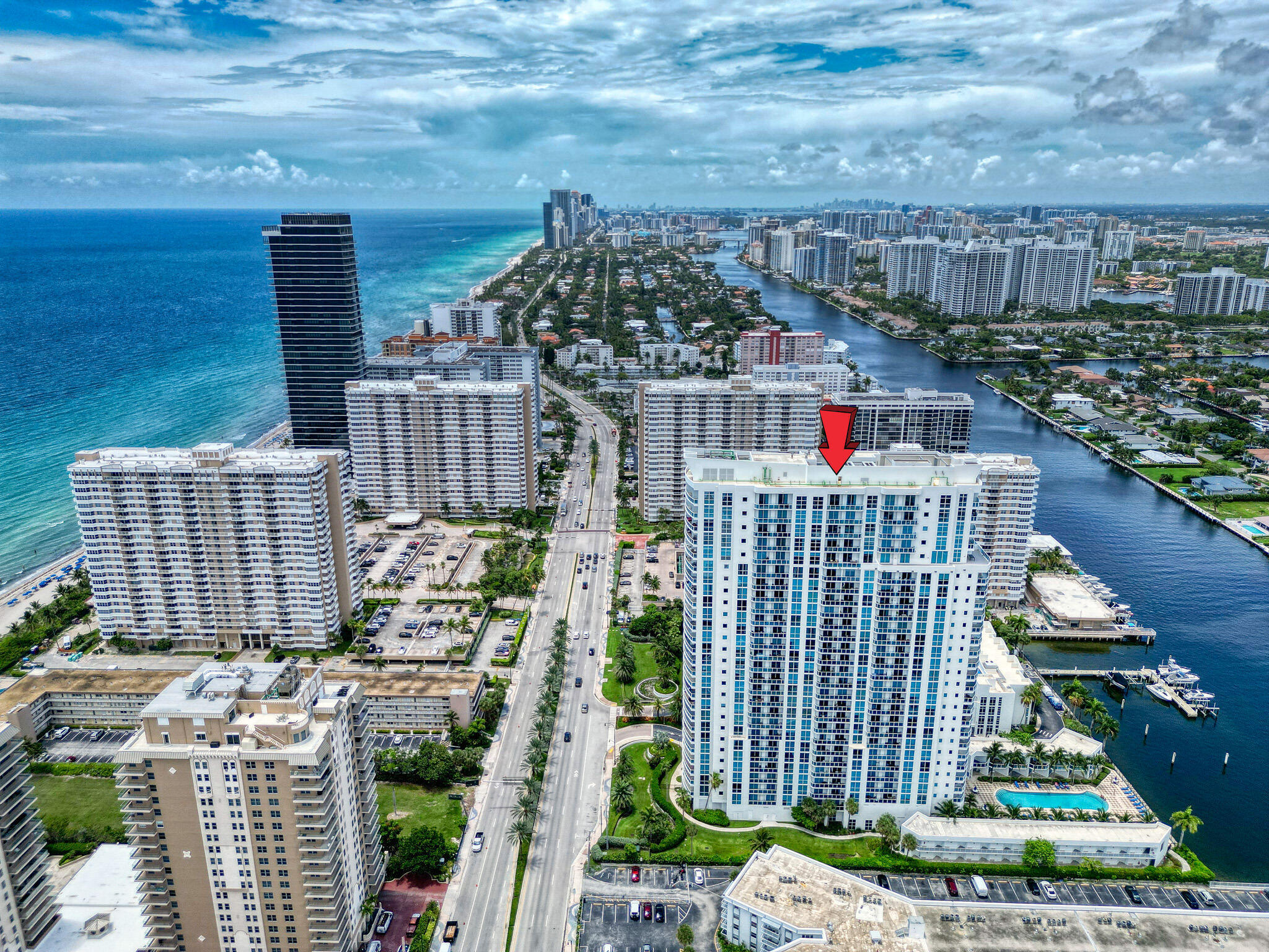 Experience Elevated Coastal Living at The Ocean Marine Yacht Club Welcome to Residence 1803 - a high-floor unit offering breathtaking intracoastal, city, and ocean views. Floor-to-ceiling impact glass windows flood the space with natural light, while the open-concept layout and expansive balcony create the perfect setting for entertaining or unwinding in absolute style. Enjoy a gourmet kitchen with granite countertops and stainless steel appliances, spacious custom closet space, and spa-inspired bathrooms. Included with the unit are two assigned parking spaces - a rare and valuable asset in this prime beachside location - along with a private poolside cabana for the ultimate in resort-style relaxation.  Ocean Marine Yacht Club offers full-service luxury living with concierge and valet