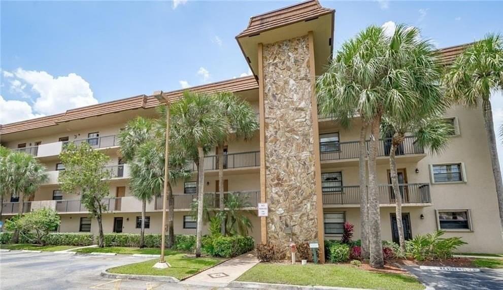 Welcome to this large 2-bedroom, 2-bathroom condominium located in Lakes of Carriage Hills .   corner unit with great water views.   Nicely updated kitchen  with stainless appliances.  Large laundry room, with full sized washer and dryer.   Offering 1,270 square feet of finished living space.  The two full bathrooms ensure convenience for residents and guests, while the thoughtfully designed bedrooms offer comfortable retreats. Situated in the Lakes of Carriage Hills community, this condo presents an excellent opportunity for those seeking practical living in the Tamarac area.