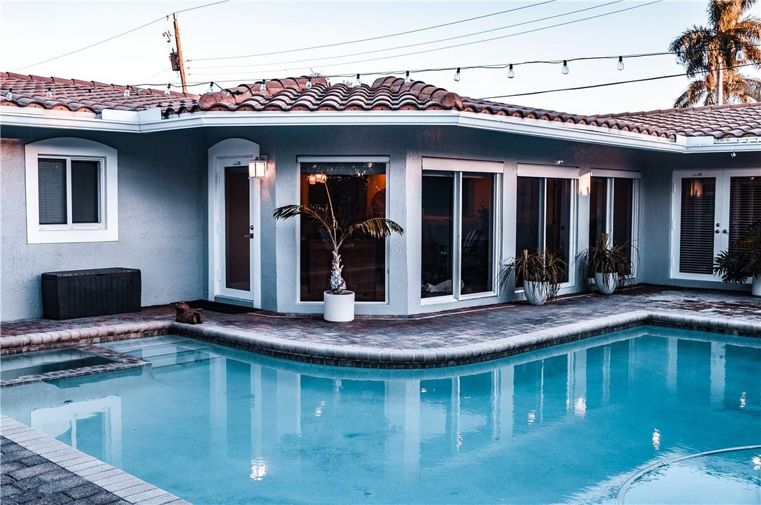 BEAUTFIFUL 3 BEDROOM 4 FULL BATHROOM HOME IN WONDERFUL LIGHTHOUSE POINT, PVC PIPES THROUGHOUT HOME (2021), NEW AC UNIT (2021/SPLIT AC (2021), NEW KITCHEN APPLIANCES (2021), GRANITE KITCHEN COUNTERTOPS, ROOF RESTORED (2021), SALT WATER POOL AND SPA WITH AQUA LINK I LINK CONTROLS, THEATER ROOM WITH 130 INCH PROJECTION SCREEN AND NEW AMPLIFIER (2021), MASTER BATH FULLY UPGRADED, PGT HURRICANE IMPACT WINDOWS THROUGHOUT HOME, FULL CABANA BATHROOM, AND LAUNDRY ROOM.