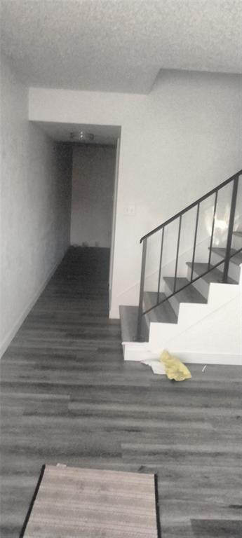 Large townhouse with 3 bedrooms on 2nd floor including a very large Master bedroom. Well maintained complex, screened patio, full size W/D.  Recently upgraded granite countertop Kitchen, new appliances and lament floors and staircase. Half bath on first floor. Separated living room and dining room. A great place for family and near to shopping, Ft. Lauderdale and enjoy what Tamarac has to offer is residents.