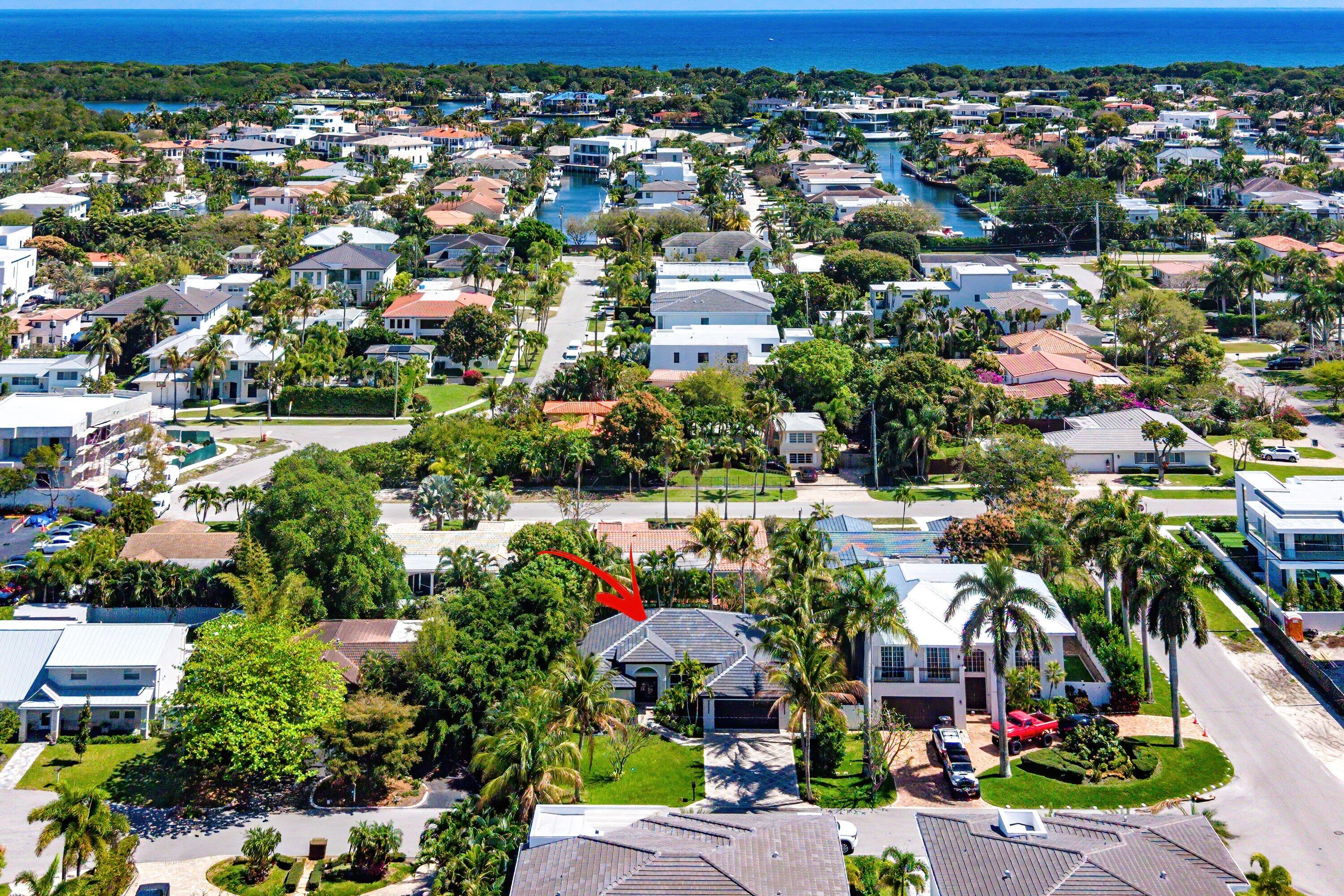 Located in the highly coveted subdivision of Boca Villas, this one level single family home is exactly what you have been waiting for! Ideally located steps from A1A and the ocean + a stone's throw away from The Boca Raton, Mizner Park, Royal Palm Place, and five-star restaurants along E Palmetto Park Road, this quaint home allows you to have the best of Downtown East Boca right at your fingertips! Enjoy the serenity of a quiet street nestled in a cul-de-sac and surrounded my multimillion dollar new construction estates. This recently renovated home offers 4 Bedrooms, 2 Full Bathrooms, Two (2) Car Garage, Private Pool, Hurricane Impact Windows & Doors, and a Brand New Roof (2026). The breathtaking chef's kitchen offers a sizable island with waterfall quartz countertops, two tone kitchen cabinetry, brand new state of the art "smart" appliances, and a full size wine cooler! Boca Villas is positioned just minutes from the Brightline's Boca Raton train station, Boca Raton Executive Airport as well as 3 major International Airports. This residence is more than just a home, it's a statement of luxury and lifestyle designed for those who demand the best.