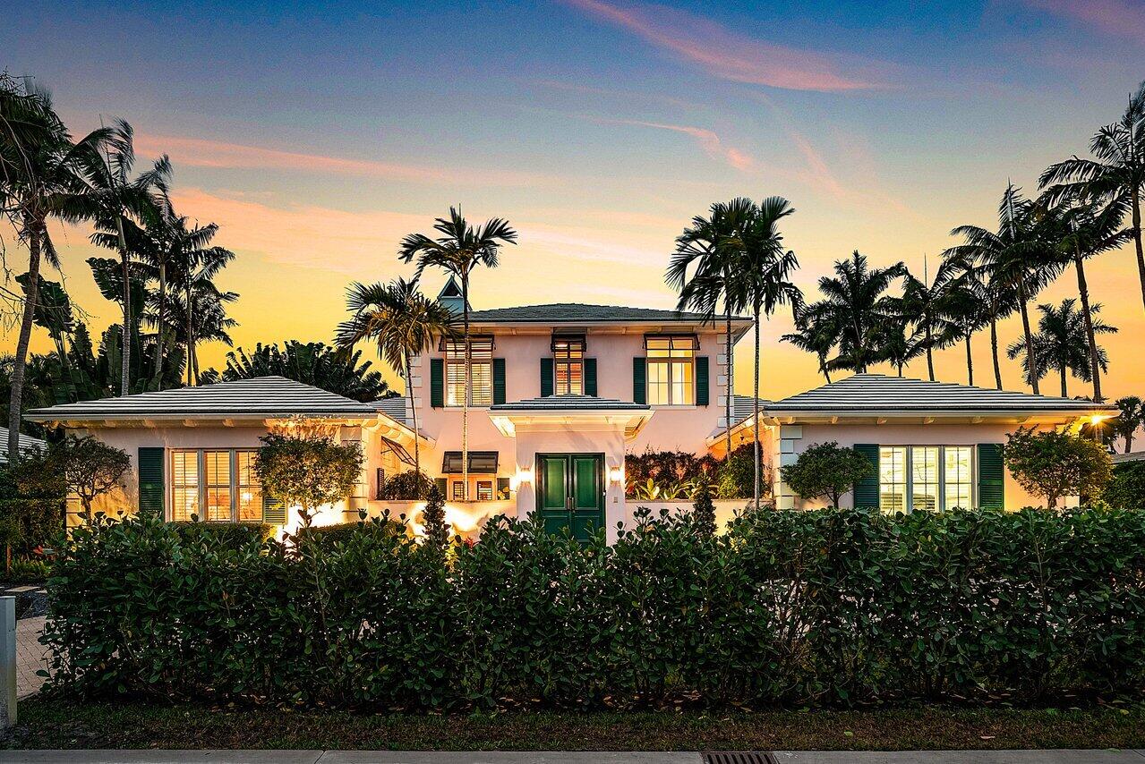 A Gulf Stream architectural gem, this residence was expertly designed by Bill Wietsma for its current owners. Showcasing the timeless appeal of classic West Indies architecture, the home is perfectly positioned on a large lot in the heart of prestigious Gulf Stream offering both elegance and convenience. Its prime location allows for an easy walk to Gulf Stream School. Sited on one of the highest elevations in Gulf Stream, this home enjoys spectacular natural light creating a bright and welcoming atmosphere throughout.  Meticulously designed, every room offers seamless access to the outdoor living areas and lush surroundings. Entering through double doors from the driveway, you are welcomed into a gracious courtyard featuring a peaceful fountain and a sunlit spot ideal for morning coffee. Inside, the home's enduring quality is immediately apparent - black walnut floors, elegant moldings, lofty ceilings, and beautifully designed transition spaces all contribute to its classic appeal.
At the heart of the home, a covered patio runs the length of the house, overlooks the pool, and connects to the main living areas, making it perfect for entertaining or relaxing. 
The guest house has a full bath, vaulted ceiling with a white beadboard ceiling and French doors.
The primary suite encompasses the second floor of the home featuring his and her bathrooms and dressing rooms. The adjoining balcony offers a serene setting to enjoy views of the property. Both an elevator and stairs ensure convenient access to this peaceful retreat.
The heated pool and spa are complemented by a large yard and lush landscaping with extensive custom lighting.
A home theater, three car garage, full house generator and built-in outdoor grill complete this very special offering