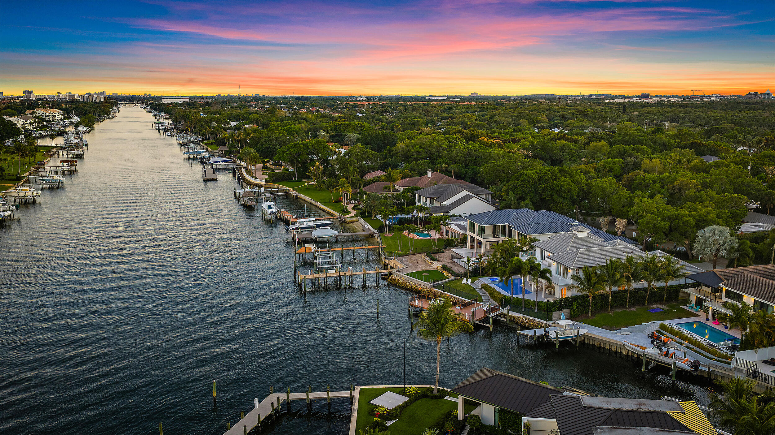 Experience premier Intracoastal living, this property offers wide water views, no fixed bridges and hard-to-find dockage accommodating multiple deep-water vessels, including a sportfish yacht and center console. Set within a no-wake zone and featuring direct ocean access just minutes from Palm Beach Inlet, this home is a dream for boating and waterfront enthusiasts. Coveted eastern exposure delivers stunning sunrises and cool afternoons. Meticulously maintained and thoughtfully updated, the existing home includes soaring ceilings, five ensuite bedrooms, private office with water views, and a 3-car garage. This is a great value to enjoy the existing house, or build new! Close to world-class golf, dining, and the best of the Palm Beach lifestyle.