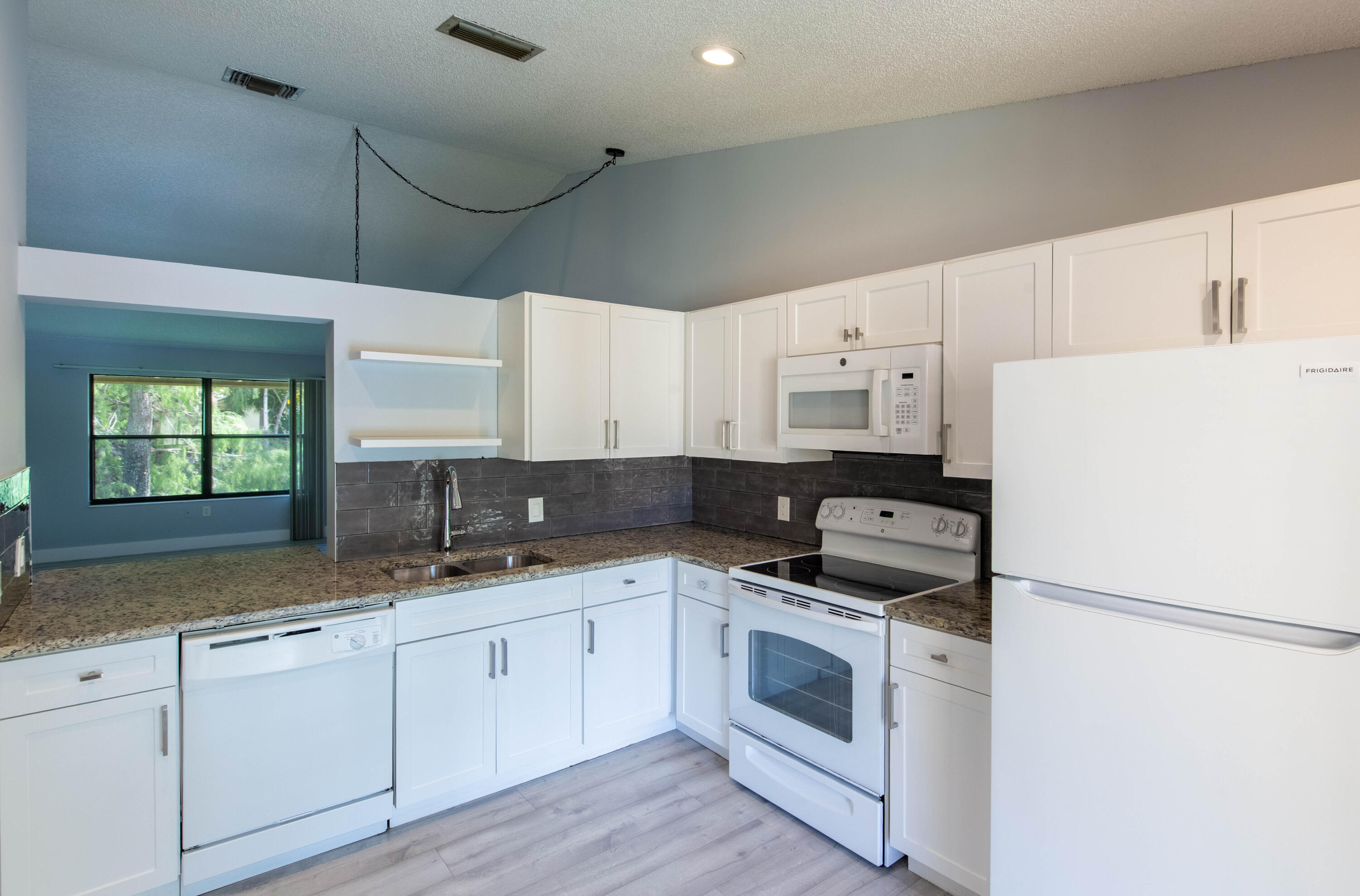 SHEFFIELD WOODS AT WELLINGTON CONDO - Residential