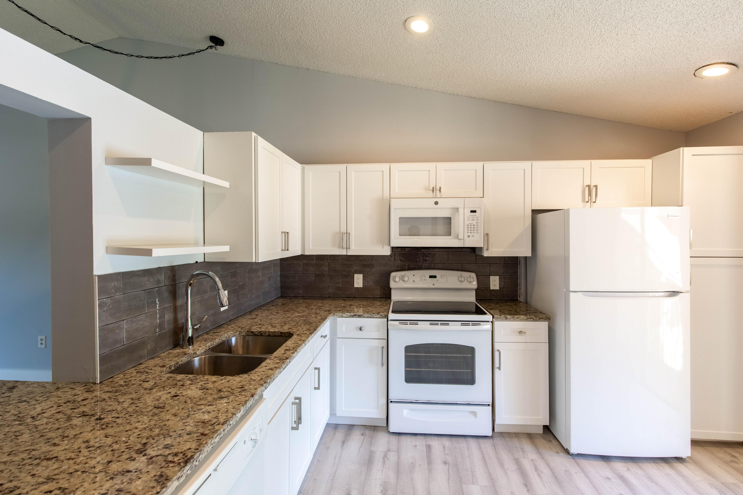 SHEFFIELD WOODS AT WELLINGTON CONDO - Residential