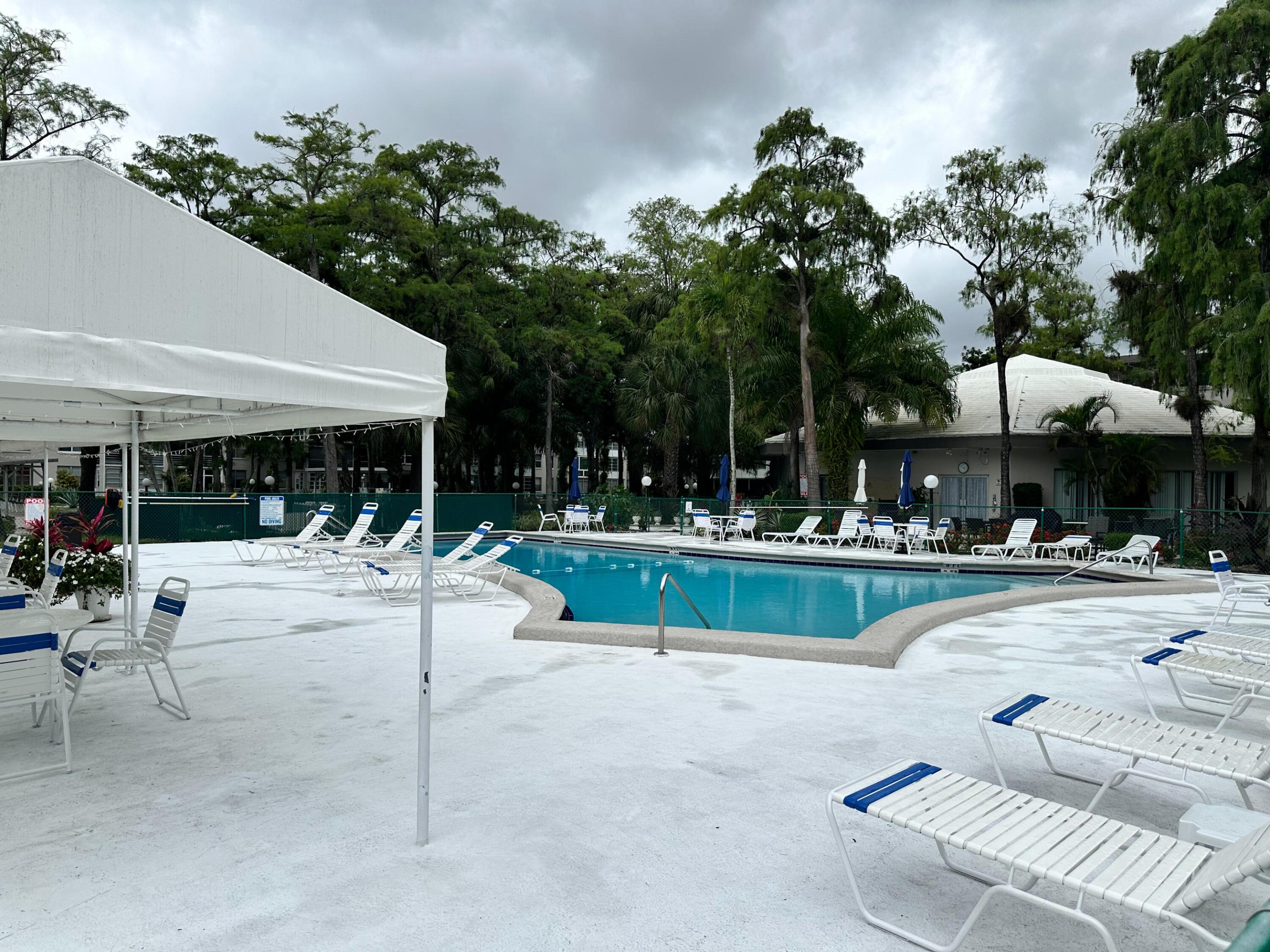 Investor special! Rare ground-floor corner unit in the sought-after 55+ Lauderhill East community — priced to sell! Sold AS-IS with all furnishings included. Great opportunity to own in an active adult community featuring 2 pools, fitness center, clubhouse, billiards room, shuffleboard, library & BBQ areas. Association fee includes water, cable & sewer. Centrally located minutes from Sawgrass Mills, beaches, hospitals & major highways. Minimum Credit Score of 700, 20% down payment required, minimum $50k annual income. See Purchase Application for other requirements.