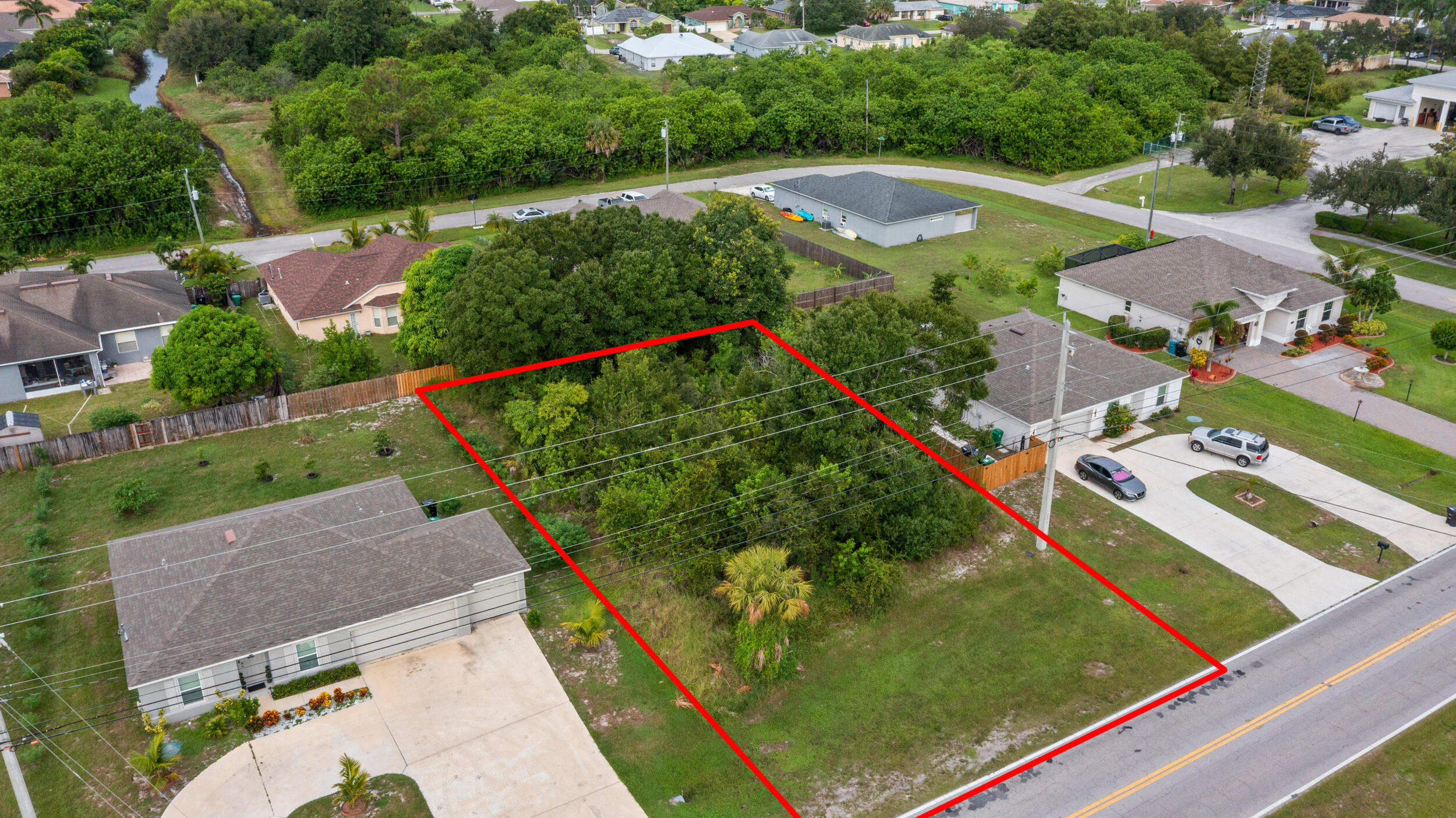Prime location in Port St. Lucie. This vacant lot offers endless opportunity in a fast-growing area near Tradition, Becker Rd., I-95 and the Turnpike. Minutes from top-rated schools, major supermarkets, dining, and shopping. Ideal for building your dream home or investment property in a quiet, established neighborhood with no HOA. Quick access to major highways makes commuting effortless while still enjoying a peaceful residential setting. A rare find in one of PSL's most desirable and convenient corridors.