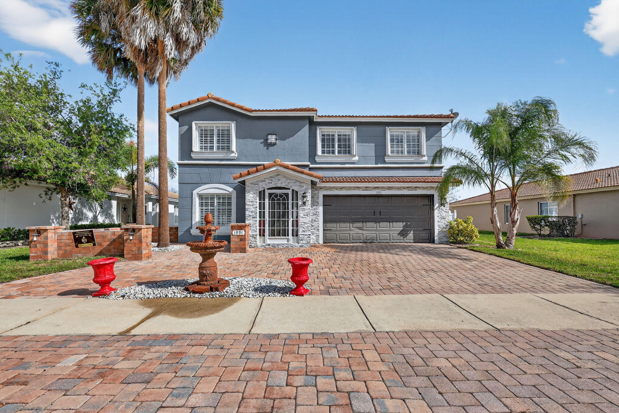 Spacious 3-Bedroom with a huge loft and possibly a 4th bedroom. Home in Sought-After Newport Isles Community. With a generous 2517 sqft of living space and an additional 20 X 35 (760 sqft) of screened back patio for relaxation or entertainment. Inside, you'll find a beautifully remodeled kitchen featuring high-quality cabinets and soft-close drawers. Newer appliances, quality tiled flooring on first floor, new wood stairs, new carpet in bedrooms. Comes with a huge loft which can be used as an office, play room or a 4th bedroom. Quality light fixtures throughout. Both bathrooms have been updated for a touch of luxury. The fenced backyard offers a serene escape overlooking a tranquil lake, perfect for unwinding after a long day. Enjoy low HOA fees, which include high-speed internet, while  while taking advantage of fantastic community amenities such as 3 sparkling pools, tennis and basketball courts, playgrounds, and a 24-hour guard-gated entrance for added security. This community is also zoned for the brand-new Legacy High School.