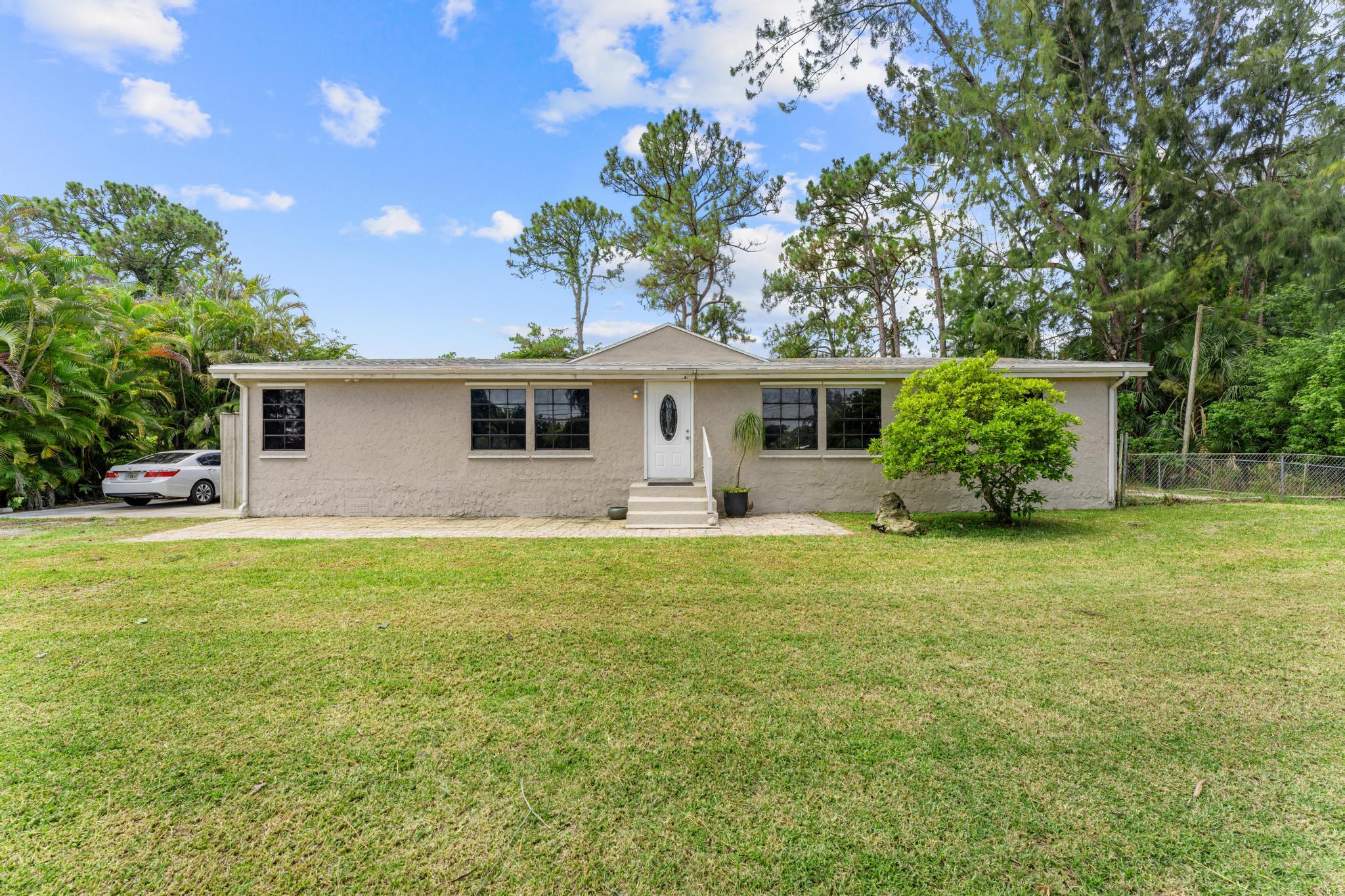 This beautifully remodeled 3-bedroom, 2-bathroom home offers comfort, functionality, and modern conveniences throughout. The remodeled interior features an updated kitchen with granite countertops, stainless steel appliances, and ample cabinet space, while the spacious living areas are enhanced by high-hat recessed lighting. A dedicated laundry room adds everyday convenience. The primary suite includes a walk-in closet, built-in vanity, and a convenient linen closet. The third bedroom includes an attached den/office, providing flexible space for working from home, hobbies, or additional living needs. The bathrooms have been semi-updated and feature tile flooring, and one secondary bedroom includes vinyl flooring. The home also features a crawl space