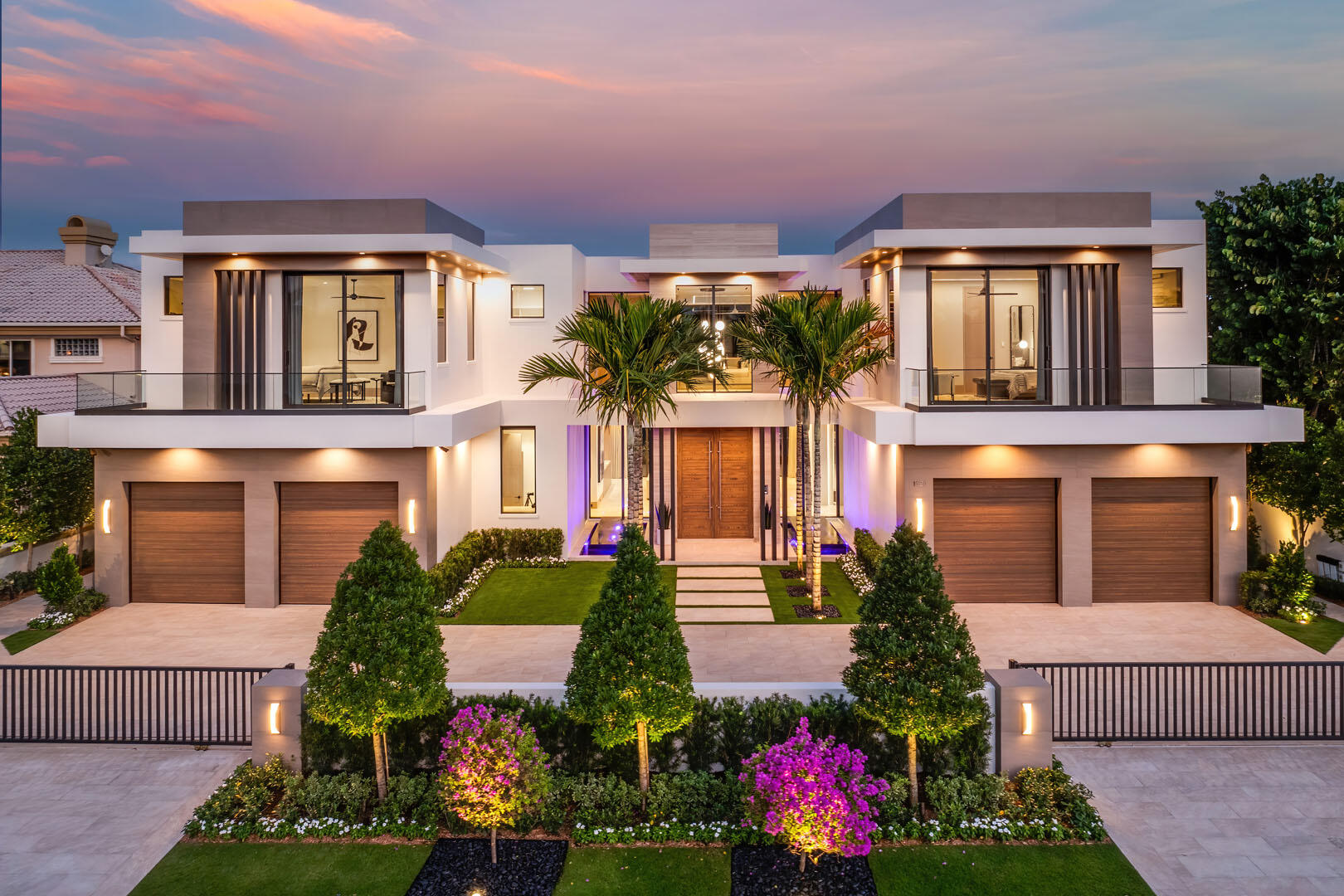 Experience a new pinnacle of luxury in this recently completed, turn-key Signature Estate by SRD Building Corp, redefining elite Intracoastal living. Just completed, this impressive residence is located on a prime lot within the exclusive Royal Palm Yacht & Country Club in Boca Raton. Spanning over 8,500 square feet, this six-bedroom estate boasts 100 feet of Intracoastal frontage with coveted eastern exposure and a 4-car plus golf cart garage. <MORE> Every element of this home is crafted for ultimate refinement, from the fully automated Crestron smart-home system to the state-of-the-art security features. The primary suite offers stunning Intracoastal views and separate His & Her spa-like bathrooms for a retreat of pure indulgence. Entertain effortlessly in the sleek clubroom, featuring a bar, billiards area, and a stunning glass wine room, or prepare culinary delights in the chef's kitchen with an inviting eat-in dining space.  The outdoor experience is unparalleled, with a resort-style backyard featuring a knife-edge pool and spa, bordered by premium turf and ambient fire features. Fully retractable screens allow for seamless indoor-outdoor living, providing year-round enjoyment in every space. Furnished by the award-winning P&H Interiors design group, this waterfront masterpiece is ready to offer an extraordinary lifestyle. The buyer is responsible for documentary stamp taxes on the deed and title insurance.