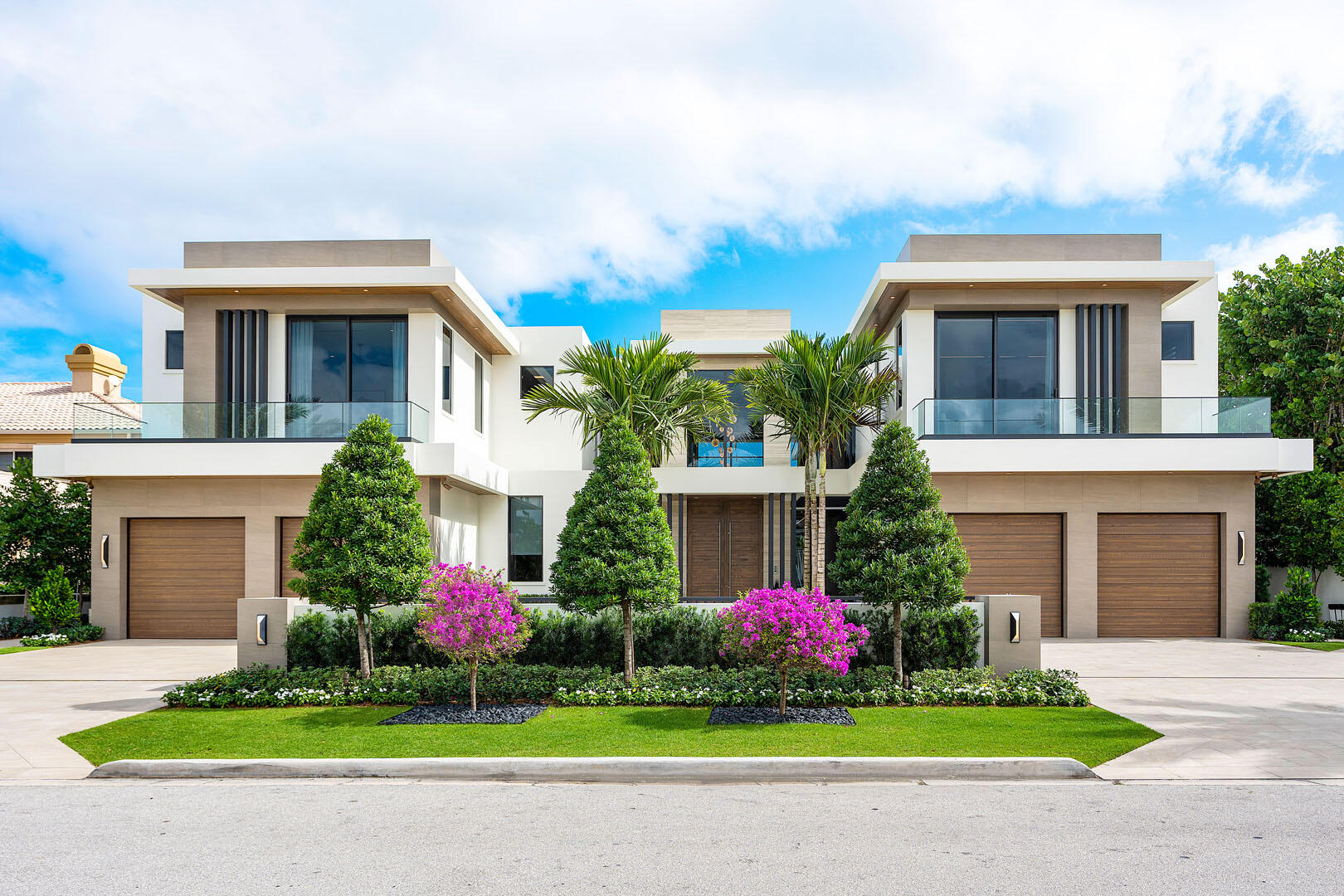 Experience a new pinnacle of luxury in this recently completed, turn-key Signature Estate by SRD Building Corp, redefining elite Intracoastal living. Just completed, this impressive residence is located on a prime lot within the exclusive Royal Palm Yacht & Country Club in Boca Raton. Spanning over 8,500 square feet, this six-bedroom estate boasts 100 feet of Intracoastal frontage with coveted eastern exposure and a 4-car plus golf cart garage. <MORE> Every element of this home is crafted for ultimate refinement, from the fully automated Crestron smart-home system to the state-of-the-art security features. The primary suite offers stunning Intracoastal views and separate His & Her spa-like bathrooms for a retreat of pure indulgence. Entertain effortlessly in the sleek clubroom, featuring a bar, billiards area, and a stunning glass wine room, or prepare culinary delights in the chef's kitchen with an inviting eat-in dining space.  The outdoor experience is unparalleled, with a resort-style backyard featuring a knife-edge pool and spa, bordered by premium turf and ambient fire features. Fully retractable screens allow for seamless indoor-outdoor living, providing year-round enjoyment in every space. Furnished by the award-winning P&H Interiors design group, this waterfront masterpiece is ready to offer an extraordinary lifestyle. The buyer is responsible for documentary stamp taxes on the deed and title insurance.