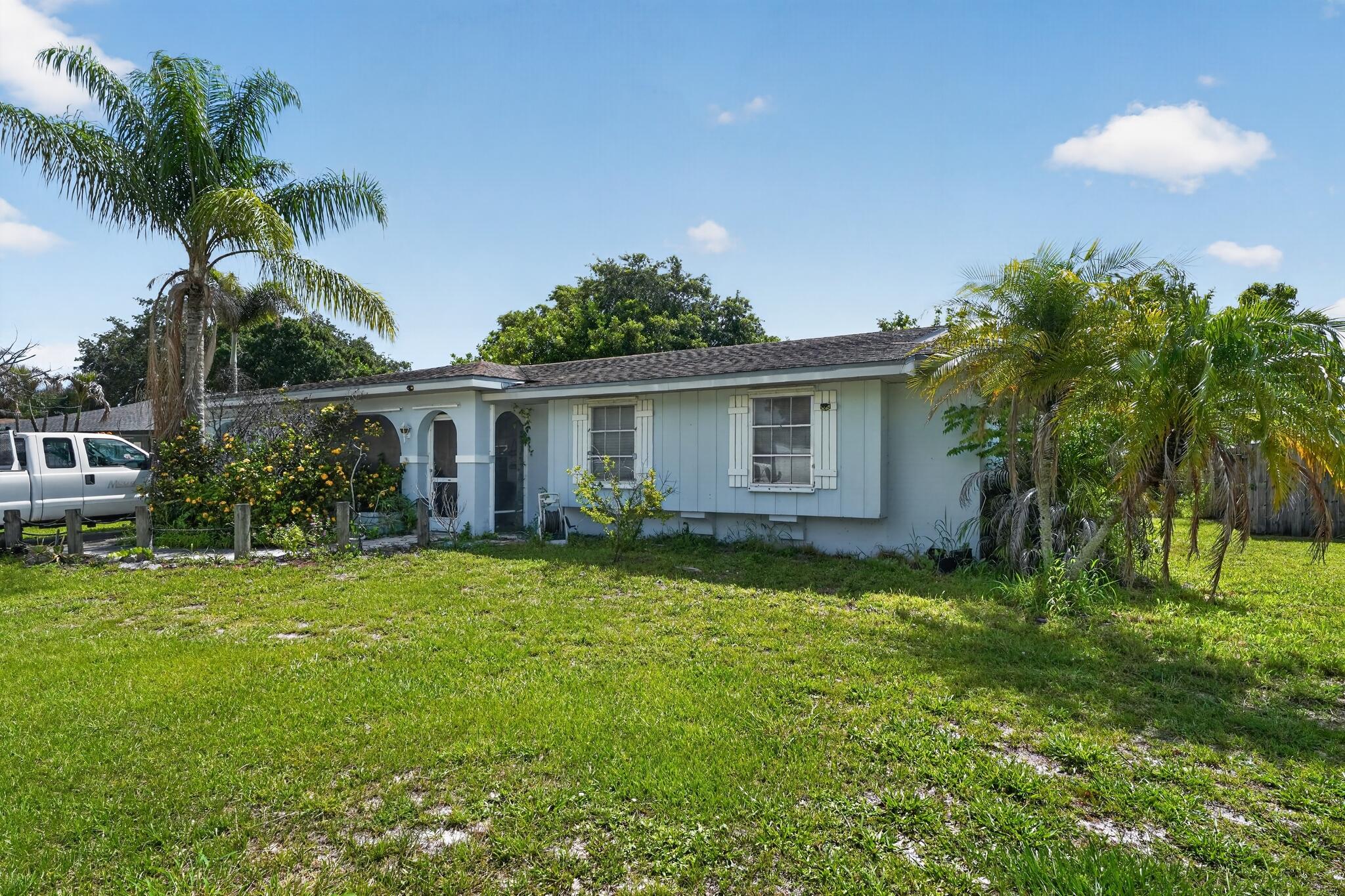 Welcome to this move-in-ready CBS home in the heart of Port St. Lucie! Offering 3 bedrooms, 2 bathrooms, and a desirable split-bedroom floor plan, featuring an updated kitchen with granite countertops, spacious living and dining areas, and beautiful marble flooring throughout. The fully fenced backyard provides plenty of space for entertaining, pets, or outdoor enjoyment. Connected to city water and sewer with no HOA, you'll enjoy added convenience and affordability. Ideally located near shopping, dining, schools, parks, and major commuter routes, this property is perfect for first-time buyers, investors, or anyone seeking comfortable Florida living. Schedule your private showing today!