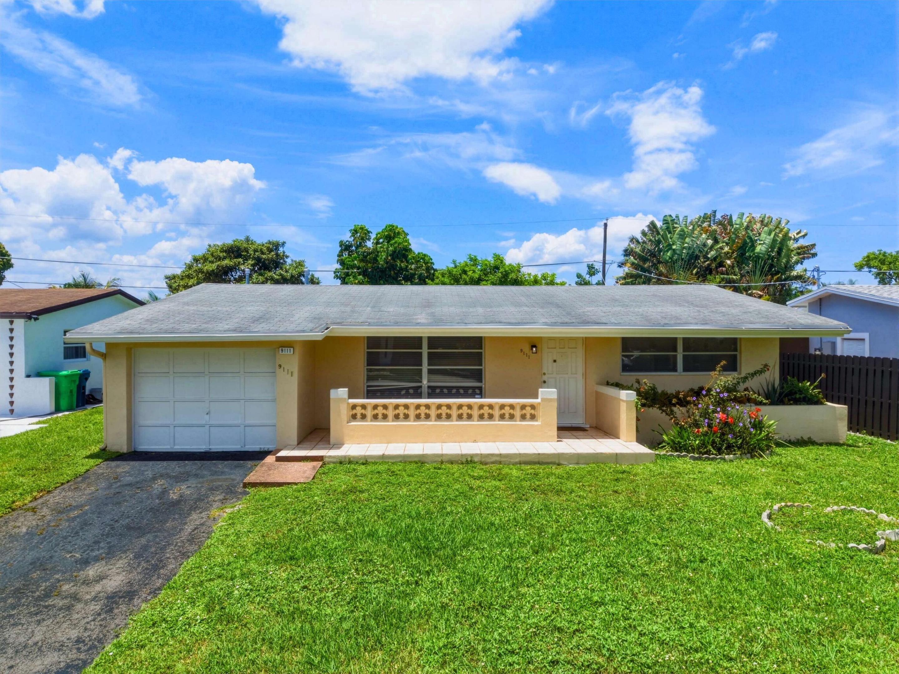 Welcome to this charming 2-Bedroom 2-Bathroom located in Sunrise Golf Village. This home boast a newer Roof, A/c, Water Heater and offers 1,537sqft,  multiple living spaces, a pass through kitchen with no HOA. Conveniently located near restaurants, shopping (Sawgrass Mills), and grocery store.  Whether you're looking for your first home, downsizing, or simply searching for a home to add your personal touch too, this is the property for you.