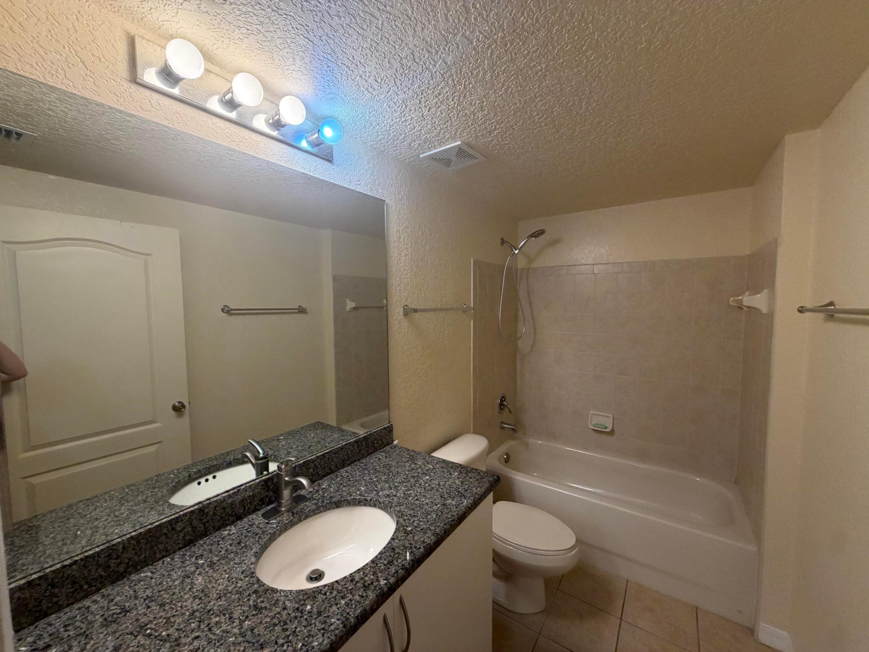 THE BELMONT AT ST LUCIE WEST, A CONDOMINIUM - Residential Lease