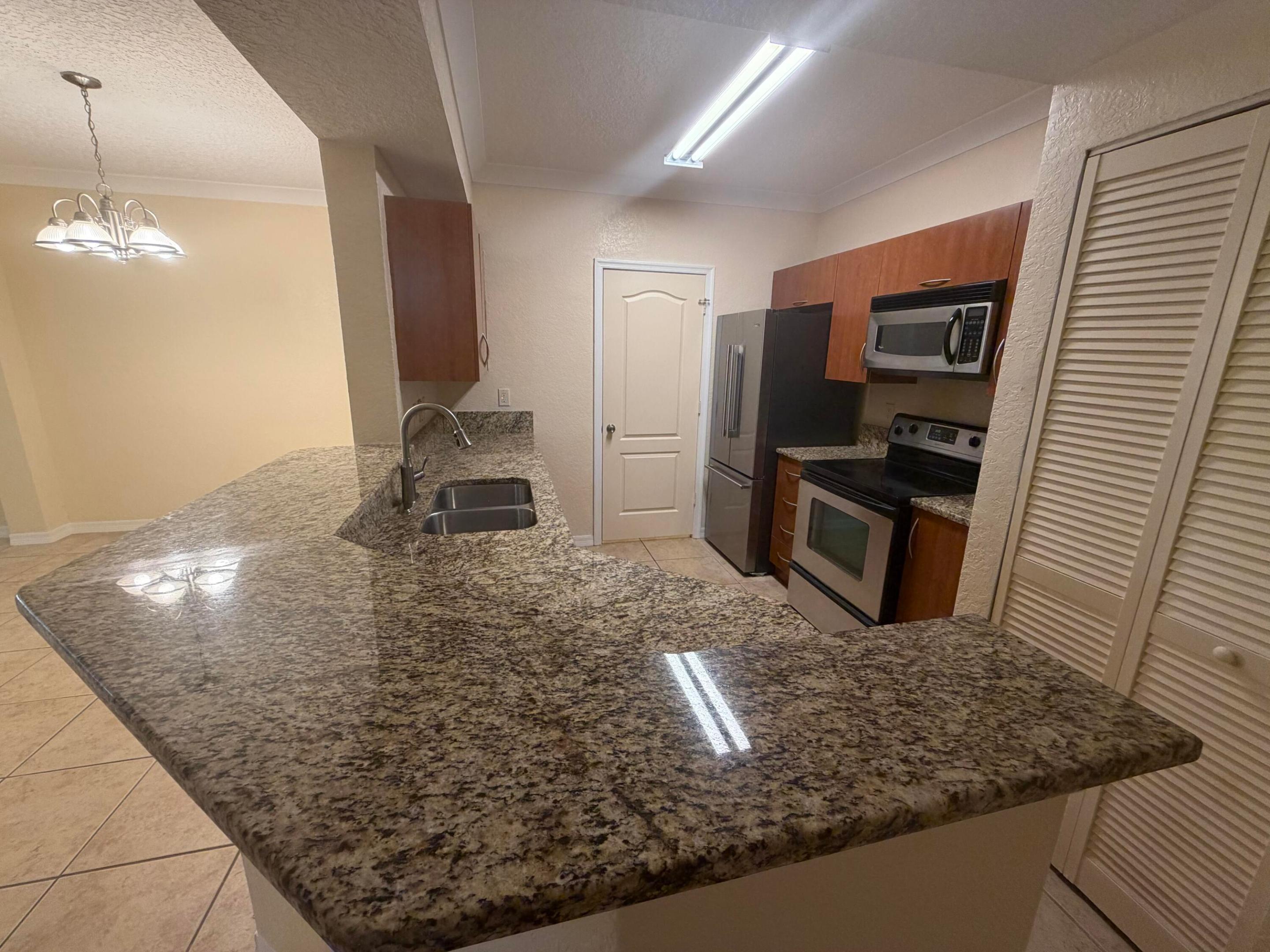 THE BELMONT AT ST LUCIE WEST, A CONDOMINIUM - Residential Lease
