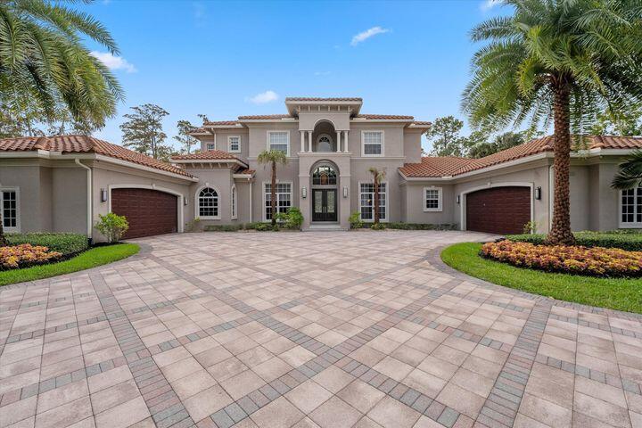 Stunning Estate home with lots of privacy,NO HOA, fenced in 1 acre yard, totally updated with impact glass, huge media room, marble floors, large open kitchen and an enormous  gated driveway with a 4 car garage for collectors.  This property is by far the nicest in the development.  ''A'' rated schools, just 20 mins to a major airport,, just 30 mins to the Ocean, lots of great Golf courses and Country Clubs within  a few miles,, highly rated hospitals within in a 5 min drive  and close to ALL the POLO and Equestrian Activities.  This Location gives you an amazing lifestyle .