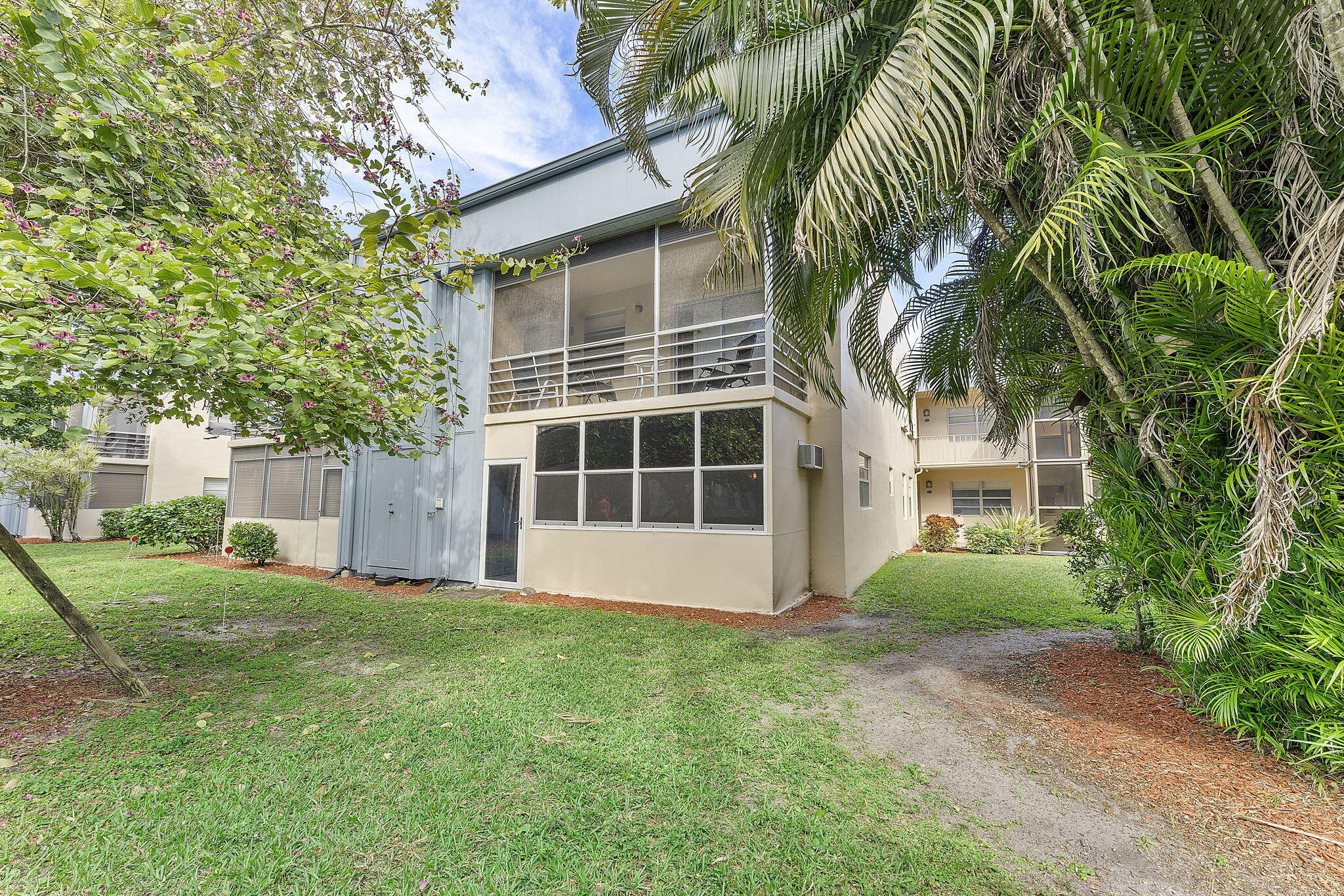 Light, bright, corner Two bedroom, two bath condo on the ground floor facing the garden. Kitchen has refrigerator and range. Stall shower in master bathroom. Tub shower in guest bathroom. Patio has impact windows and washer and dryer. Community offers bus service, golf courses, five outdoor pools, indoor lap pool and resistance pool, shows, ceramic classes, card games, bingo, community events and so much more!