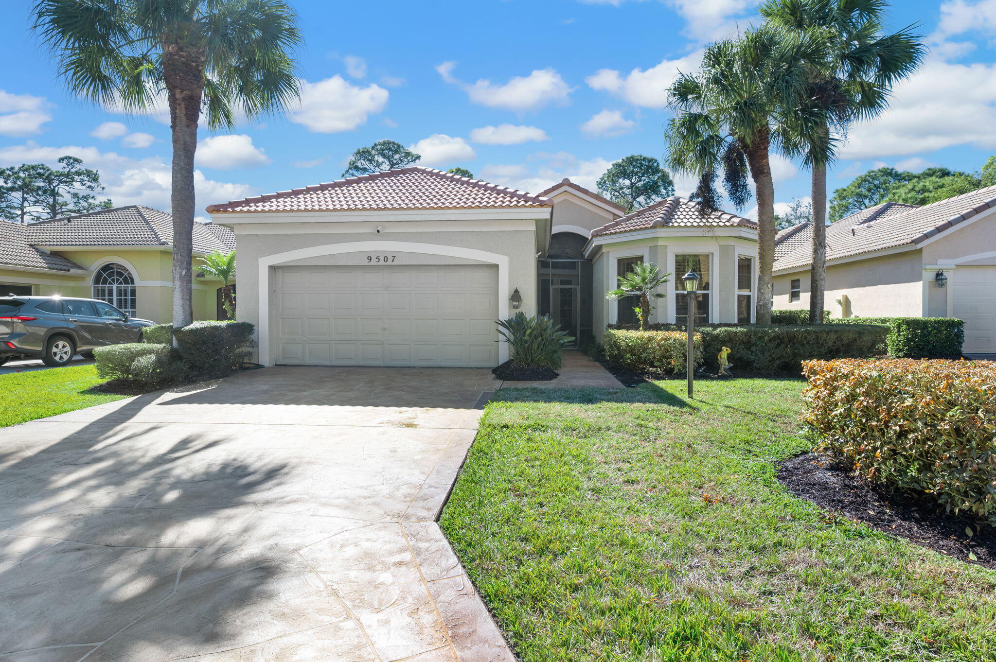 NEW ROOF!! Enjoy peace of mind and effortless Florida living in PGA Village. This Arthur Rutenberg-built 3-bedroom, 2-bath single-family home with a 2-car garage is ideally positioned on the golf course with the added bonus of a rare natural preserve backdrop filled with mature trees for extra privacy and beautiful views.  Designed for today's lifestyle, the open-concept layout offers light-filled, comfortable living spaces that flow seamlessly to a spacious patio, perfect for relaxing or entertaining outdoors. Recent improvements include a newer A/C, freshly painted exterior, an updated sprinkler system, and a maintenance-free stamped concrete driveway.  Level 2 EV Charger installed in garage Thoughtfully updated and impeccably maintained, this home is truly move-in ready in one of Port St. Lucie's most desirable golf communities.
