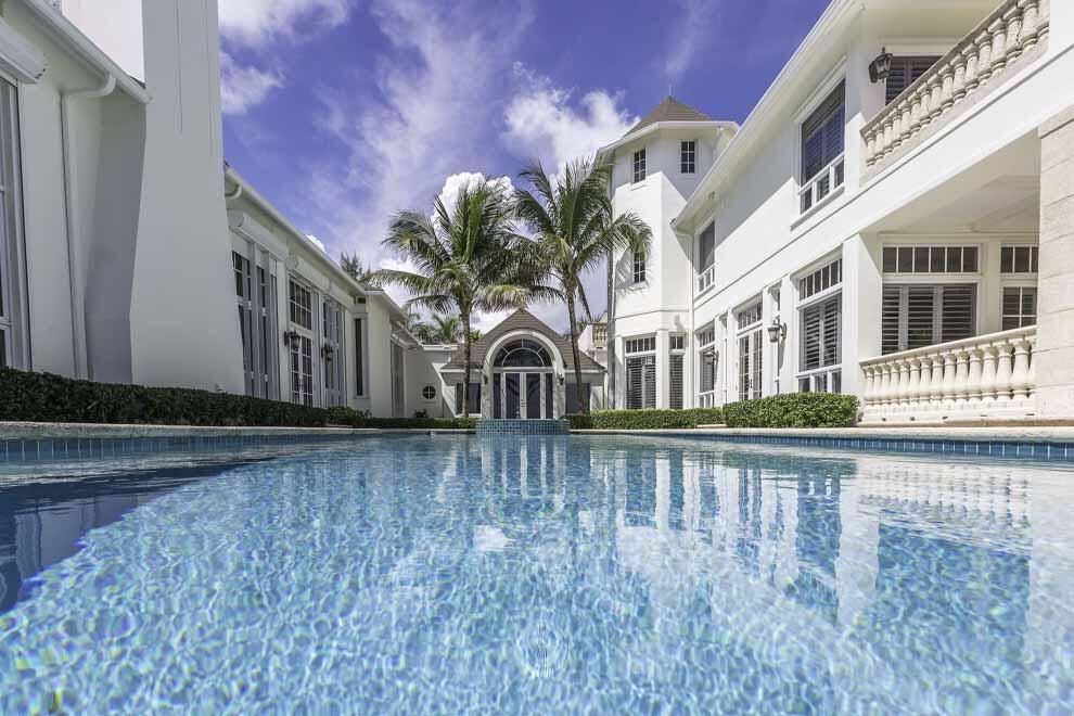 Rare opportunity to acquire a direct oceanfront compound located in Delray's famed Estate Section just south of Atlantic Ave. The property sits on an incredibly deep lot with 100 feet of oceanfrontage and almost 700 feet from the road to the ocean. Delray is known for its massive oceanfront parcels and enjoys one of the best beaches in the country. The home was built in 1994 and features over 12,000 square feet; 7 bedrooms; oversized first floor master wing with direct ocean views; office; theater/game room; formal dining; large kitchen and family room with butler's pantry; staff quarters; second floor oceanfront master with balcony; cabana; large pool; gated; volume ceilings and natural light throughout. Enjoy the home, renovate, or build your dream home. The possibilities are endless!