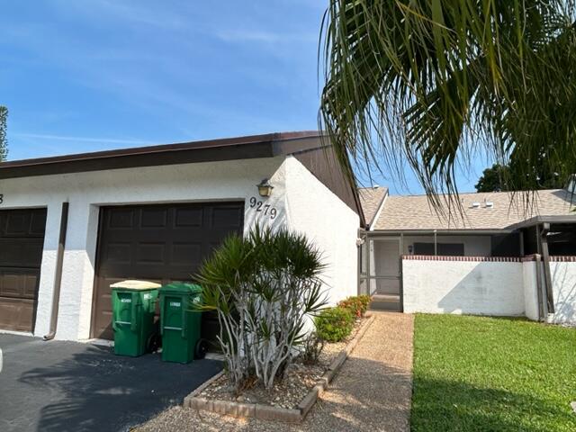 BEAUTIFUL 2/2 1 STORY VILLA WITH 1CAR GARAGE OVERLOOKING TRANQUIL BACKYARD AND GOLF COURSE. 2 PATIOS FRONT OPEN AND BACK SCREENED IN. GREAT FOR BBQS ,RELAXING, AND CHILLING OUT.  VAULTED CEILINGS LIGHT AND BRIGHT THROUGHOUT VILLA.   WALL UNIT IN LIVINGROOM STAYS. SPLIT BEDROOM PLAN. NEW ROOF 2024 APPROX.  YOU WILL FALL IN LOVE THE MOMENT YOU WALK INTO THIS VILLA. CLOSE TO SHOPPING, PUBLIX, RESTURANTS, SCHOOLS, PARKS AND MORE.