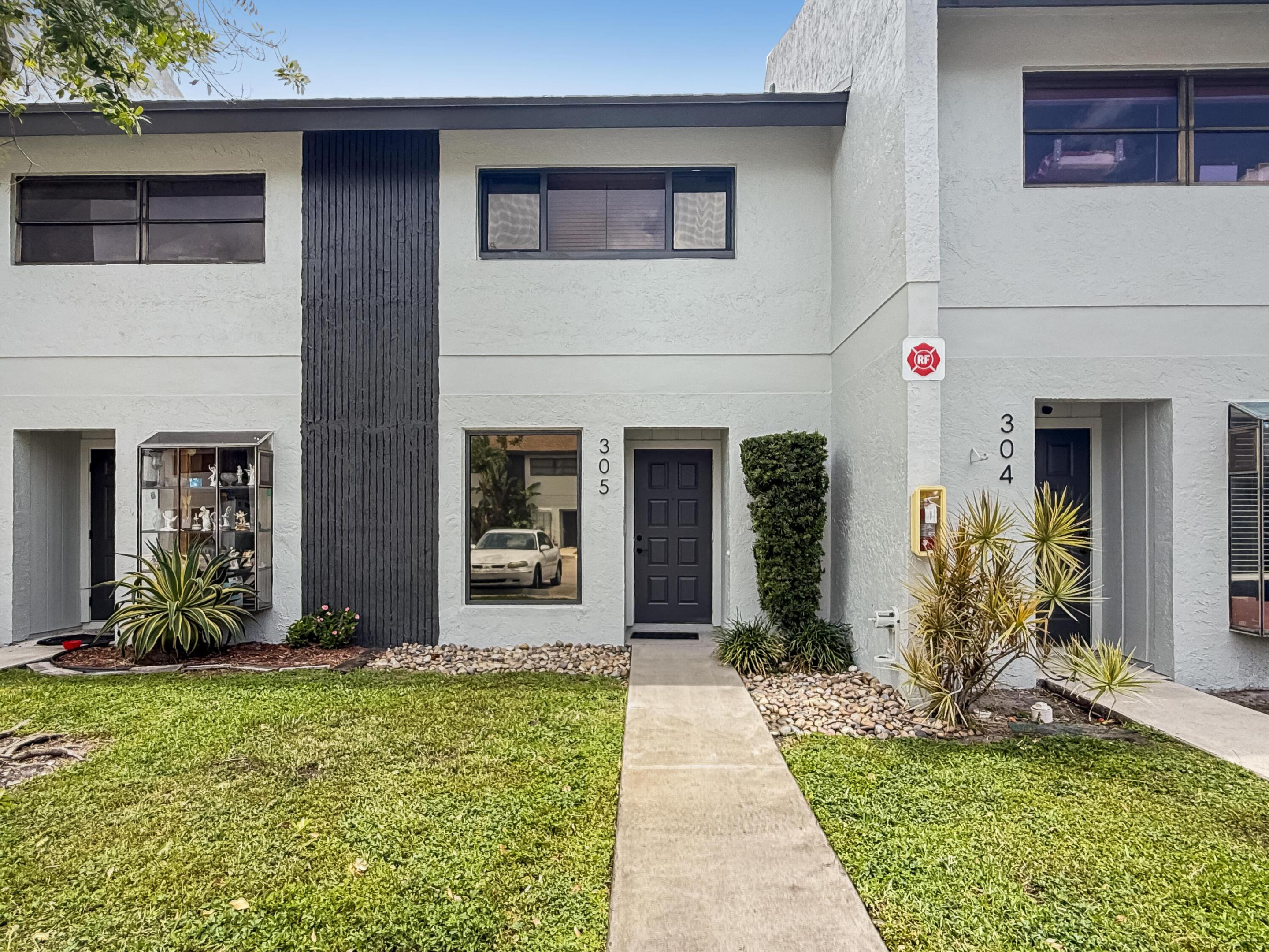 Beautifully updated 2-bedroom townhouse in The Pines of Oakland Forest! This move-in ready home features travertine flooring downstairs, laminate flooring upstairs, impact windows and doors, and a private fenced patio perfect for relaxing or entertaining. The updated kitchen offers modern cabinetry, stainless steel appliances, and functional workspace. Upstairs baths were remodeled in 2024 and the downstairs half bath was recently updated. Major upgrades include A/C and water heater (2023), washer/dryer (2024), and dishwasher/disposal (2025). Spacious layout with 1 full bath and 2 half baths, plus washer/dryer in unit. Reserved parking right outside your front door. Enjoy the community pool, clubhouse, walking paths, and active neighborhood atmosphere in centrally located Oakland Forest.