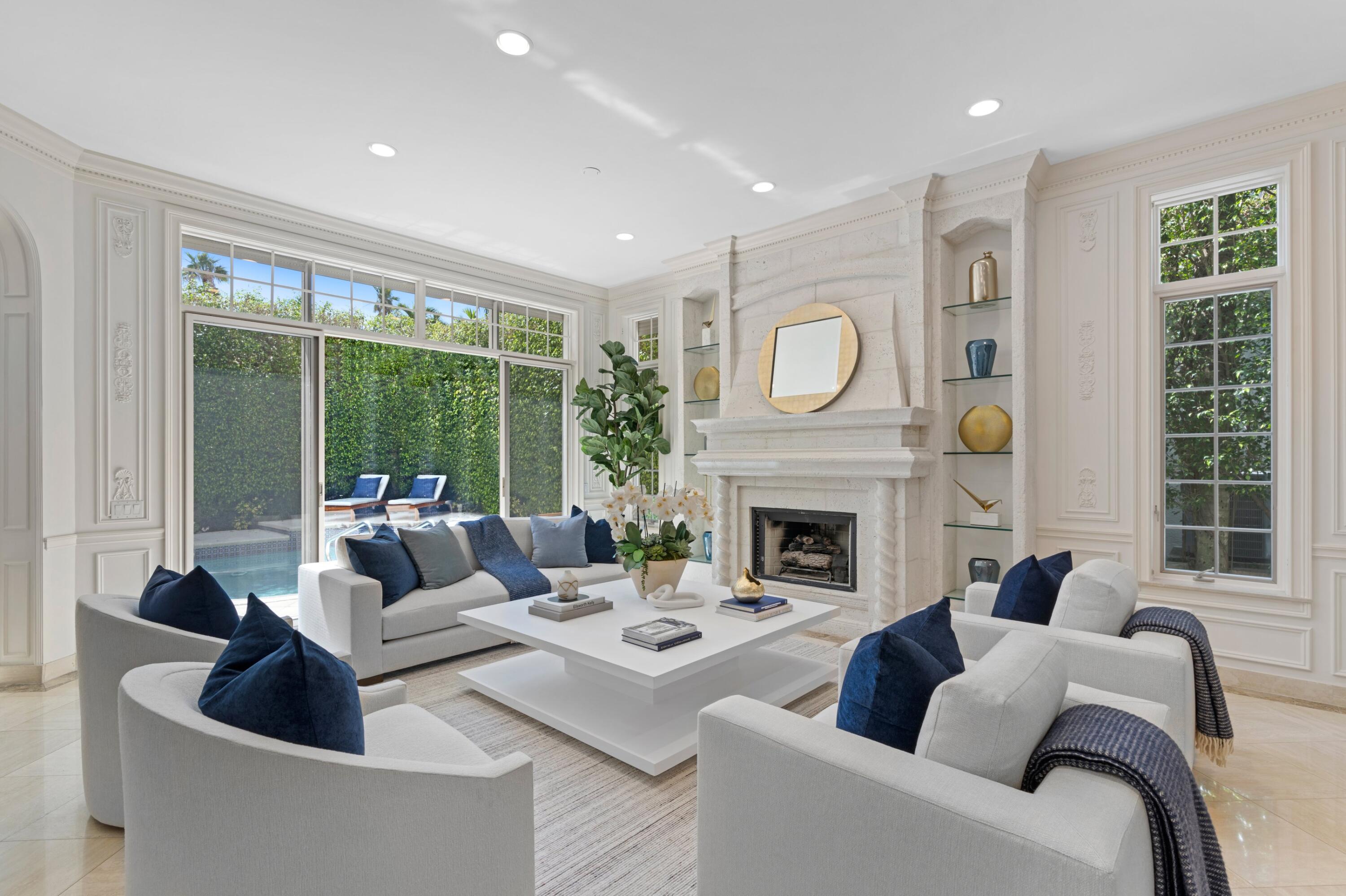 252 Atlantic is perfectly situated in between the Lake Trail and the Beach. This home has a phenomenal layout with 3 bedrooms plus a large office, 4 bathrooms, and a powder room. The generous primary suite has dual baths and 2 large walk-in closets. 

This non-HOA townhome boasts soaring ceilings, a grand staircase, an elevator, generous outdoor pool area, and stunning southern exposure. A 2-car garage with high ceilings, lush landscaping, generator, and electric storm shutters complete this private oasis in the heart of Palm Beach.