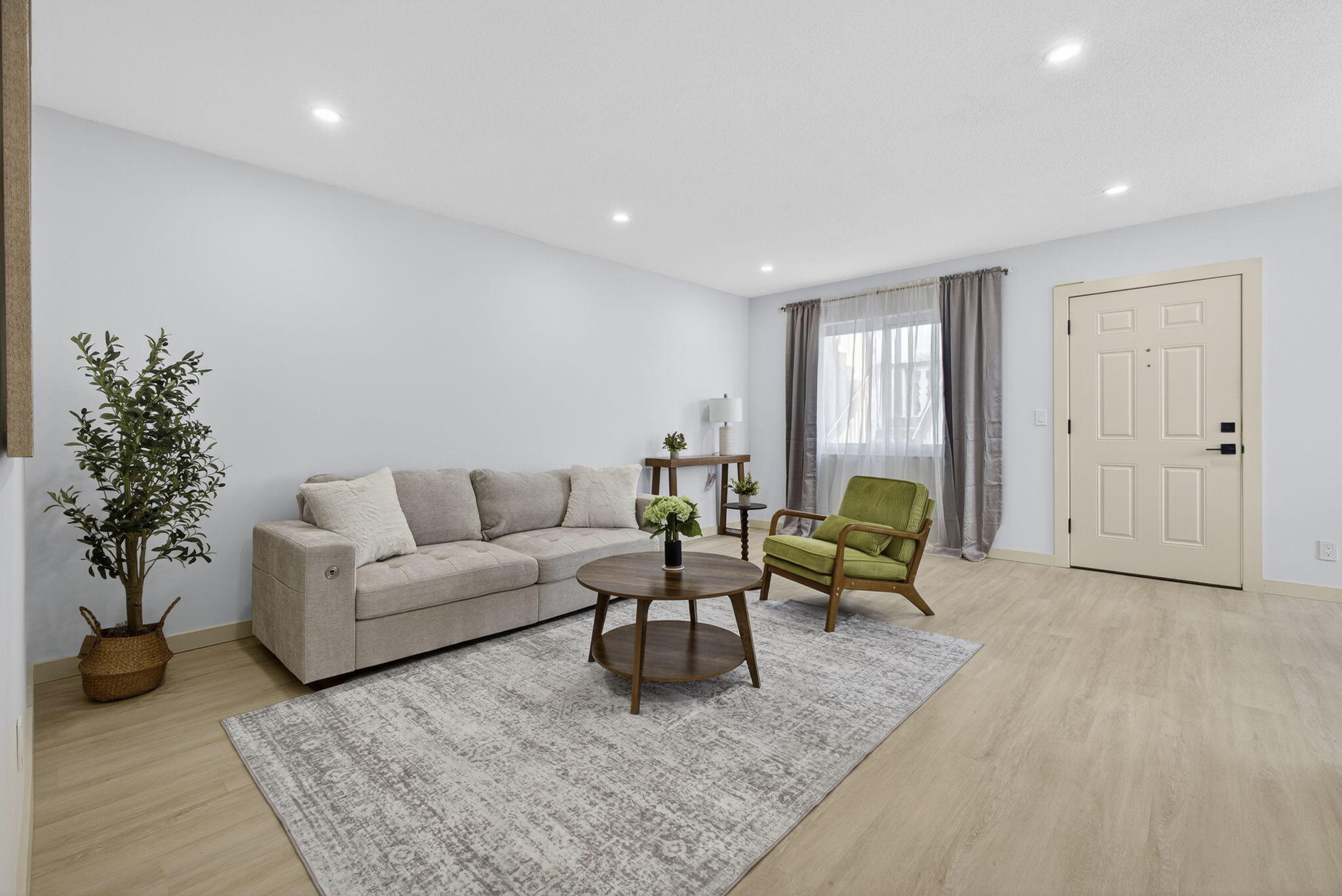 Stunning fully renovated corner-unit condo in a premier 55+ community. This light-filled 2-bedroom, 2-bath residence offers a sophisticated open floor plan with elegant wood-grain plank laminate flooring throughout. All windows and doors are impact, providing peace of mind and energy efficiency. The updated kitchen features brand-new stainless steel appliances, new cabinetry, and quartz countertops. Bathrooms are beautifully renovated with designer tile, modern vanities, and stylish lighting. Additional upgrades include a brand-new A/C unit (2025). Residents enjoy resort-style amenities including clubhouse, fitness center, pool, walking paths, bus service, and an active social calendar. Can be sold fully or partially furnished with all-new, never-used furniture. SELLER FINANCING!