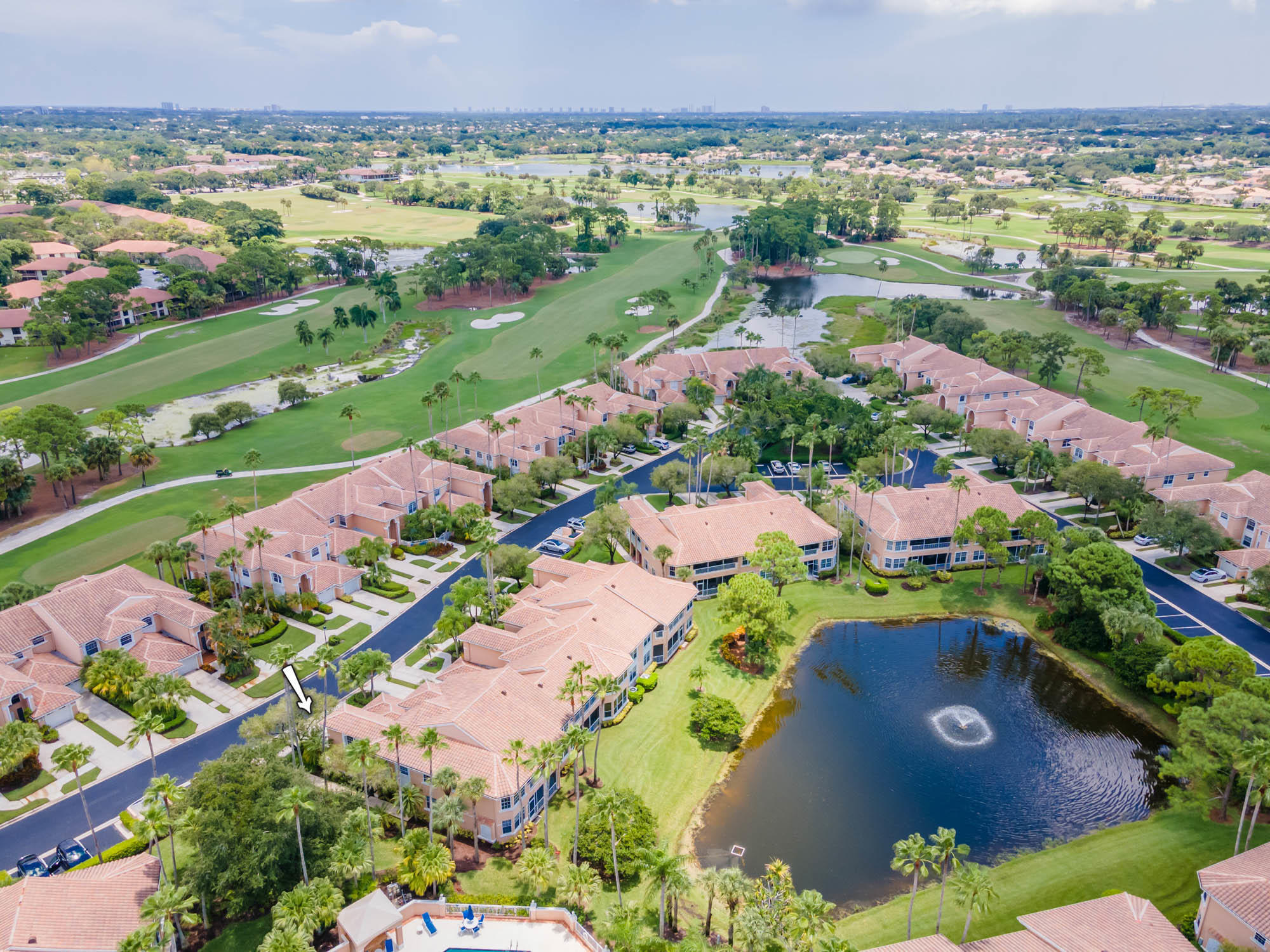 Available Now! Enjoy beautiful lake views from one of the largest 3 bedroom condos in PGA National in the wonderful Legends community. With volume ceilings, an open and bright floorplan, Zodiaq quartz countertops and stainless steel appliances, the upgrades are endless with this property. The expansive master suite has a spacious walk-in closet and vaulted ceilings. This property features an incredible outdoor living space with a tiled screened lanai and perfect views of the lake and fountain. The property features two dedicated dining areas which makes it perfect for entertaining in this beautiful home. The Legends has a pool and backs up to the 3rd tee box of the Champion golf course, home of the Honda Classic, as well as offering everything else that life in PGA National includes.