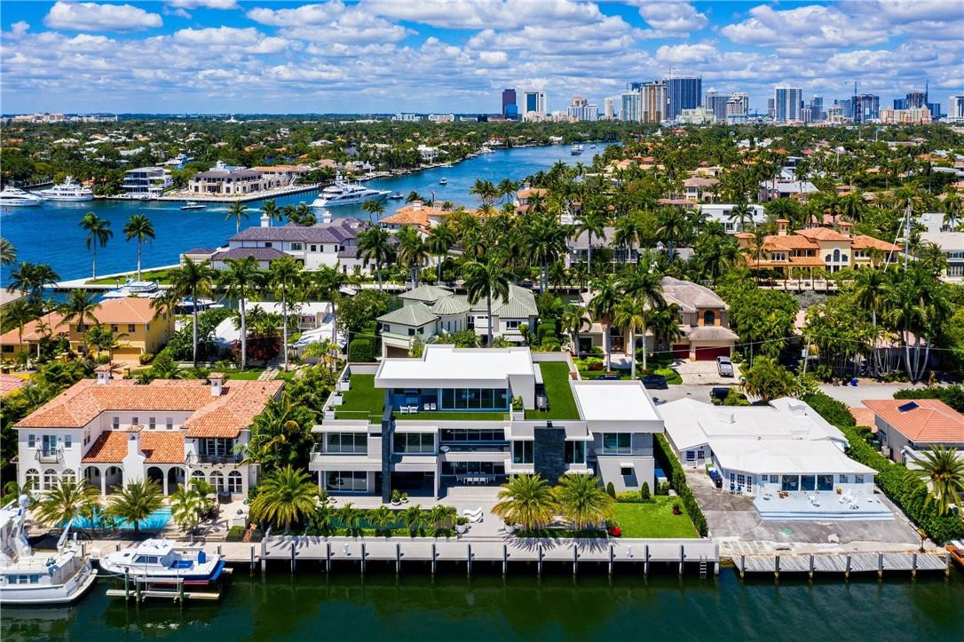 New Construction waterfront home/3-story design is the highest quality & most luxurious gated estate in prestigious Las Olas Isles! Spectacular floor plan like no other offers: 7 bedrooms w/ multiple bedrooms having their own living/sitting room. 9.5 baths,some featuring steam showers and/or sauna. Italian kitchen featuring sub-zero & Wolf appl.  This soft modern estate offers 131' of waterfront w/ direct ocean access. Lap pool w/ built in spa & out door kitchen/dining. 3rd floor club room & wet bar opens to an abundance of balconies/outdoor living w/ amazing views sunrise to sunset. Custom elevator, separate entrance for full mother-in-law/staff suite. Smart home technology includes integrated sound system,3 gas fire places. 6-car/garage incl 2-single arm car lifts. Truly Outstanding! New Construction waterfront home/3-story design is the highest quality & most luxurious gated estate in prestigious Las Olas Isles! Spectacular floor plan like no other offers: 7 bedrooms w/ multiple bedrooms having their own living/sitting room. 9.5 baths, some featuring steam showers and/or sauna. Italian kitchen featuring sub-zero & Wolf appl. Designed for an entertainer, this soft modern estate offers 131' of waterfront w/ direct ocean access. Lap pool w/ built in spa & out door kitchen/dining. 3rd floor club room & wet bar opens to an abundance of balconies/outdoor living w/ amazing views from sunrise to sunset. Custom elevator, separate entrance for full mother-in-law/staff suite. Smart home technology includes integrated sound system, 3 gas fire places. 6 car garage incl 2-single arm car lifts.