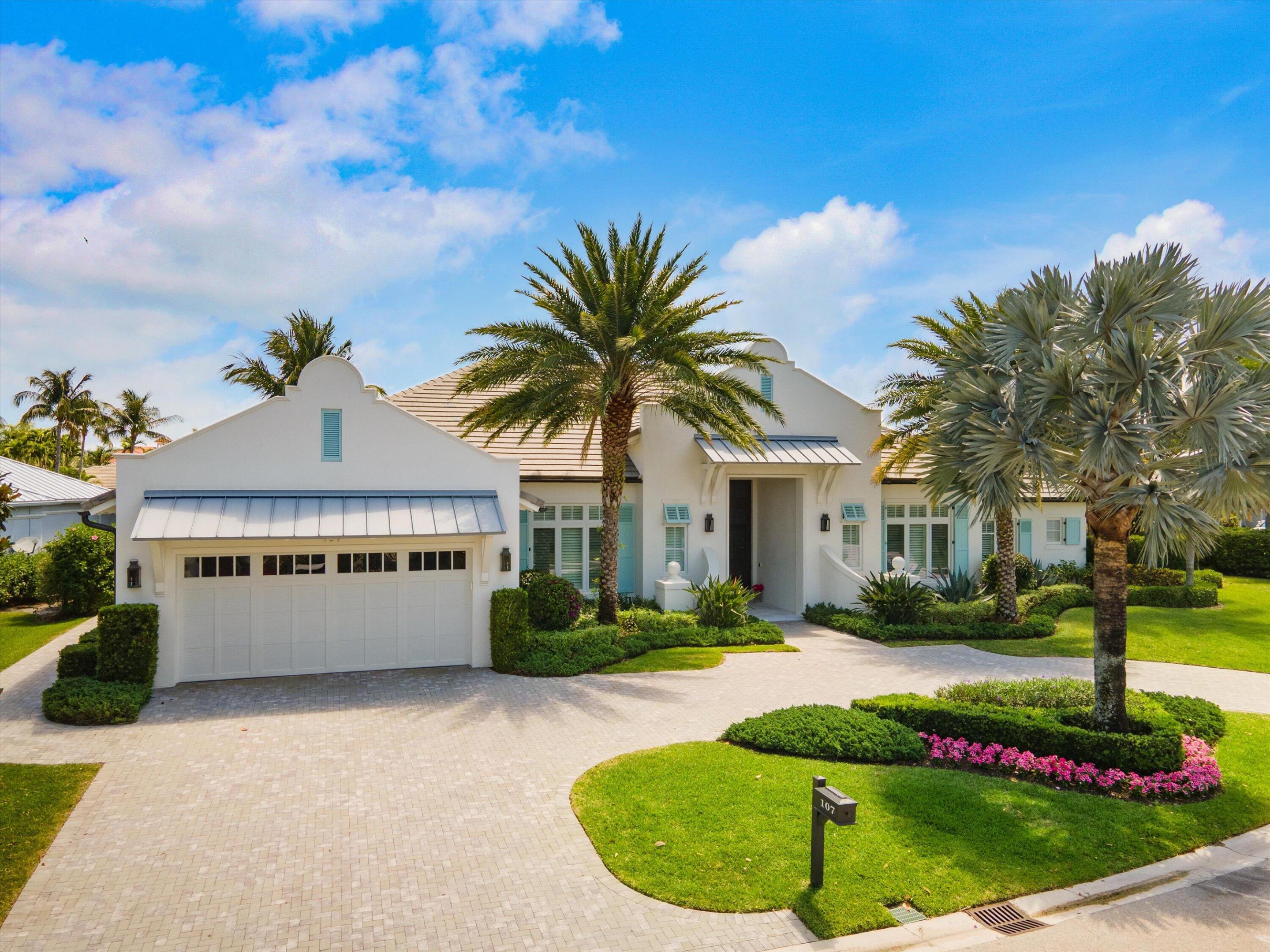 Exquisite custom-built residence completed in 2019, offering 4 bedrooms, 5.1 baths, a club room, and a 2-car plus golf cart garage. Showcasing expert millwork throughout, this home features a luxurious primary suite with a sitting area, dual walk-in closets, and his & hers primary baths—one with a steam shower. Premium finishes include Thermador appliances, a whole-home Sonos audio system, and a whole-house generator. The expansive lanai boasts a tongue-and-groove ceiling, remote-controlled screens, and a summer kitchen. Relax adjacent to a luxurious salt water pool and spa with upgraded automation; and enjoy the peaceful surroundings of the spacious artificial turf yard. Located in The Loxahatchee Golf Club enjoy one of South Floridas most exclusive Golf and Country Clubs in America; ranked #17 in Forbes Magazine 2025 boasting a custom signature Jack Nicklaus designed golf course.