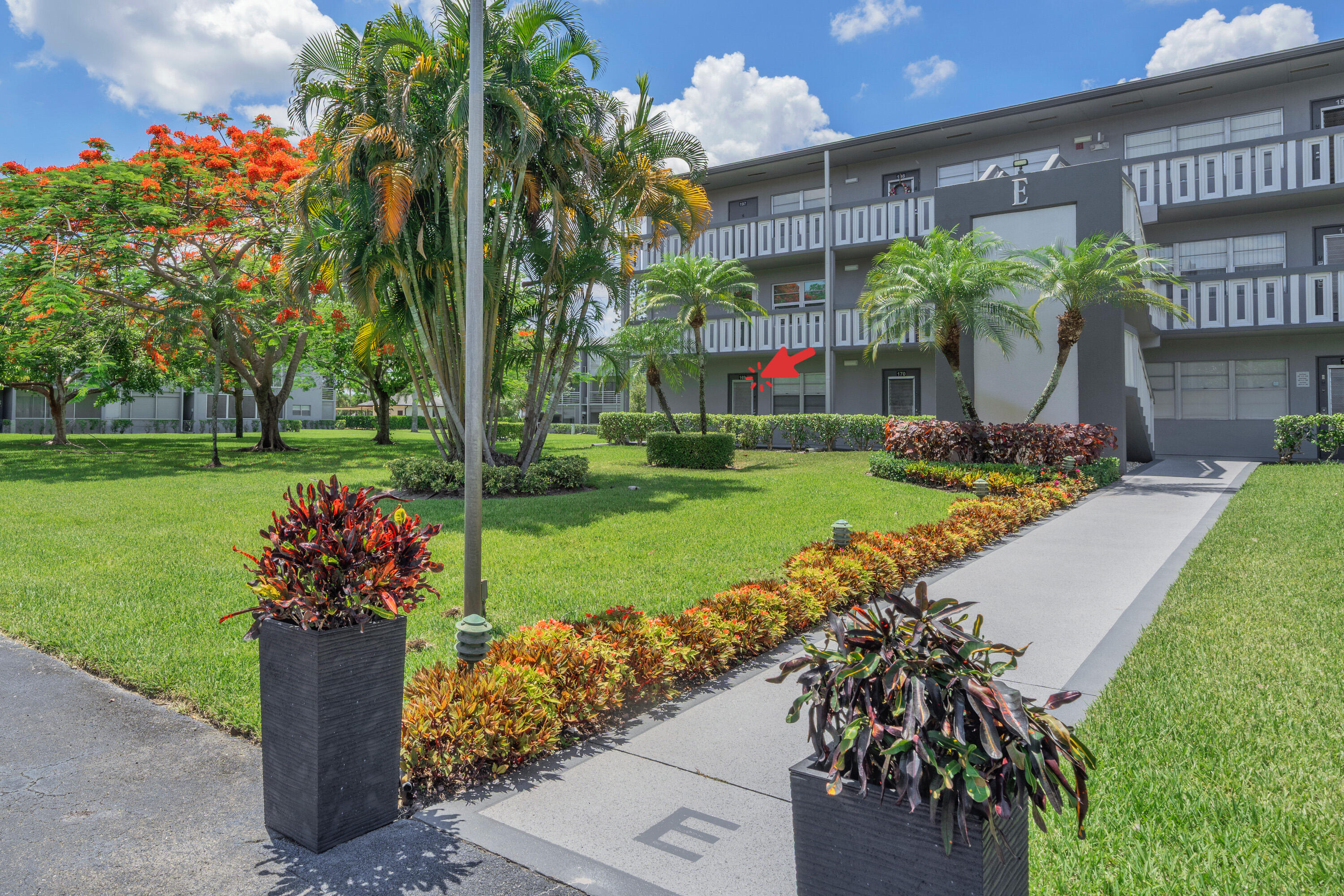 Welcome to 169 Suffolk E, Boca Raton, FL 33434 - a beautifully updated 2-bedroom, 1.5-bath ground-floor corner residence located in one of Boca Raton's most sought-after 55+ gated communities. This light-filled home offers an inviting open layout with abundant natural sunlight streaming through multiple windows, creating a bright and cheerful living environment throughout. The spacious floor plan features tasteful updates, comfortable living areas, and a desirable corner-unit location that provides additional privacy and extra windows. The primary bedroom offers direct access to a covered and screened patio, the perfect place to enjoy your morning coffee, unwind with a good book, or relax while enjoying South Florida's beautiful year-round weather. Residents enjoy the security and convenience of a gated community along with an exceptional array of resort-style amenities and activities designed for an active lifestyle. Enjoy social clubs, fitness opportunities, swimming pools, tennis, pickleball, entertainment, classes, community events, and countless opportunities to connect with neighbors and friends. Ideally situated in the heart of Boca Raton, this sensational location places you just minutes from world-class shopping, dining, golf courses, parks, cultural attractions, and pristine Atlantic beaches. Nearby destinations include Town Center at Boca Raton, Mizner Park, Boca Raton's vibrant restaurant scene, and easy access to major highways, making it convenient to explore everything South Florida has to offer.  Whether you're seeking an active social lifestyle, a peaceful retreat, or the best of both, this beautifully maintained residence offers an exceptional opportunity to enjoy the Boca Raton lifestyle in comfort and style.