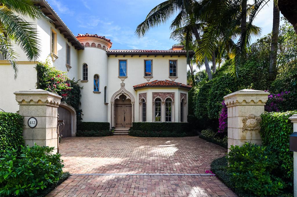Outstanding desirable in town  Mediterranean residence with exceptional details throughout, high ceilings, beautifully detailed moldings,fireplaces, formal living and dining rooms,gourmet kitchen with  adjoining family room, all overlooking the pool and patio.  A dramatic winding staircase leads to the grand master bedroom with two baths en suite, sitting area and private terrace.  There are 3 guest suites with private baths.  House has a total of 5 bedrooms, 6 and a half baths. Two Car Garage with privately gated entrance.
