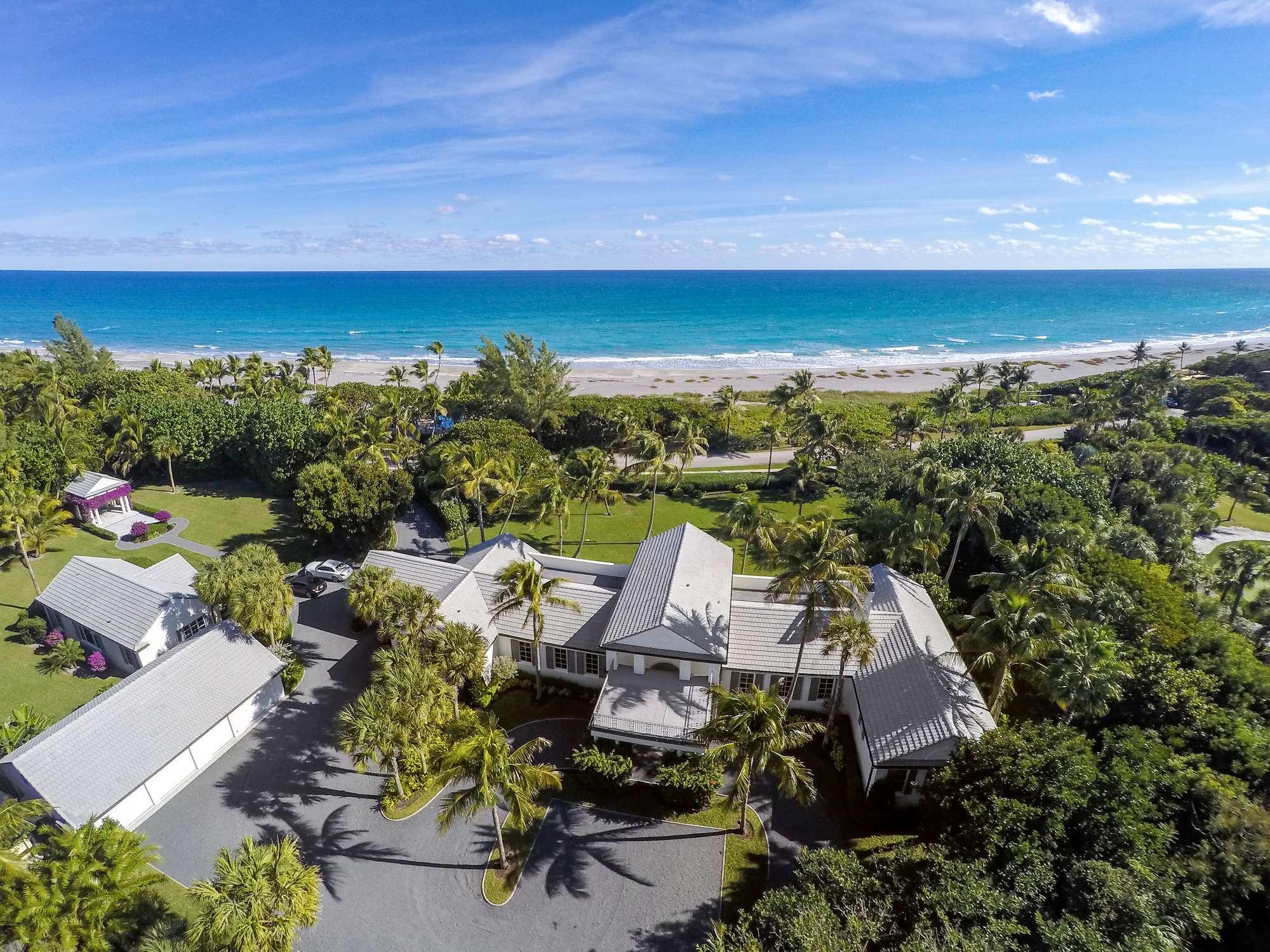 ''Scatter Joy'' is a wonderful home nestled in the heart of Jupiter Island!  This Estate rests on just over 2 Acres with incredible ocean views and also has a direct oceanfront parcel with 100 ft. on the Atlantic Ocean.  The main home and guest house were tastefully renovated by Turtle Beach Construction in 2006.  The main home has 2 bedrooms with a wonderful office which could be converted to a bedroom and 3 full baths and a powder room.  The guest home has 2 bedrooms each with their own bath and a living area designed for guests for both brief and extended visits!  There is also a Kohler Brand generator with a gross capacity of 50kw.