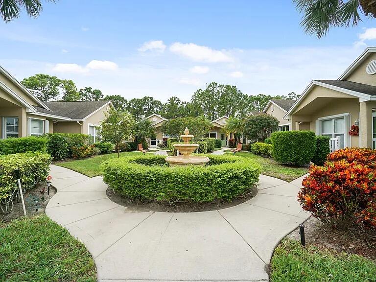 Beautiful bright 2/2 villa in the very desirable King's Isle 55+gated community. Set in a lush landscaped courtyard of 8 villas. Well maintained A/C in excellent condition and HWH. New appliances in kitchen with a pantry closet, special water filter installed at the sink and new flooring . Large walk-in shower in the master bathroom w/new bathroom fixtures as well as a large walk-in closet. Tub/shower combo with new fixtures in guest bath.  Newer w/d in laundry room. Full attic for storage . Low HOA of $496/month includes cable TV and Internet, landscaping, clubhouse, gym, library, tennis and pickleball courts. Enjoy many of the clubs activities or just relax in your newly updated screened Lanai with new waterproof vinyl flooring and new screen/storm door with a view of the preserve.