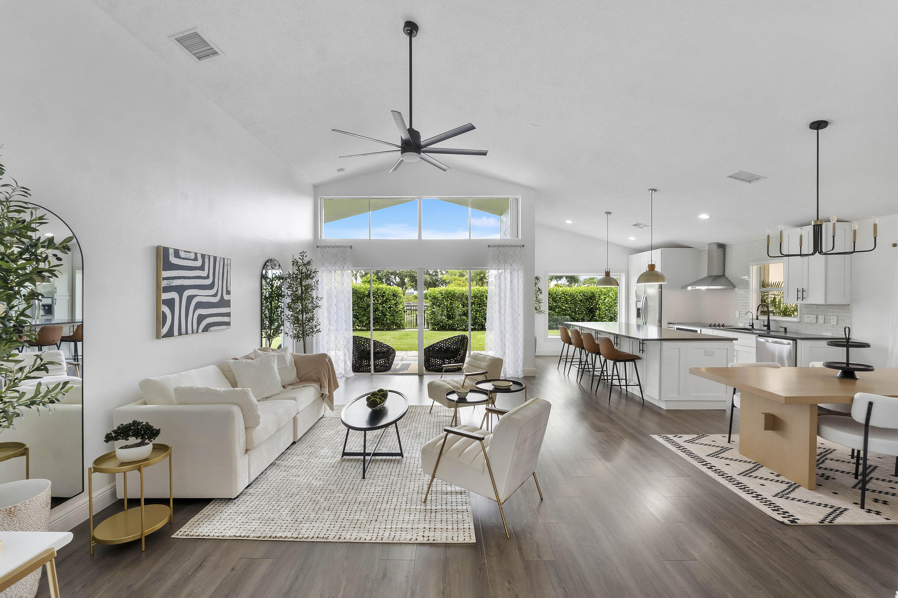 All-ages gated community in west Delray Beach with resort-style amenities and low HOA fees covering clubhouse, pool, tennis/pickleball, security, landscaping, and exterior painting. 3 bedrooms, 2 bathrooms, 1,600 sq ft single-story single-family home on a private ~0.13-acre water view. Open floor plan, soaring vaulted ceilings, jumbo sized kitchen island with seating.  2-car attached garage. Resort pool + spa/sauna. 26,000 sq ft clubhouse with restaurant/bar, fitness center, social halls, card/yoga rooms.  Lighted clay tennis courts, pickleball courts, bocce courts, basketball court, playground. Nearly 2 miles of walking/biking paths, open green spaces, scenic lakes. Minutes to Atlantic Avenue (dining, shopping, entertainment), beaches, golf, Turnpike, airport and medical facilities.  Ideally located in the heart of west Delray Beach, Polo Trace places residents just minutes from world-renowned Atlantic Avenue, known for its vibrant dining, shopping, art galleries, entertainment, and nightlife.  Beautiful South Florida beaches, championship golf courses, major highways including the Florida Turnpike, airports, and top-rated medical facilities are all conveniently nearby, providing the perfect balance of luxury, convenience, and recreation. This is a wonderful opportunity to own in one of Delray Beach's premier all-ages gated communities with resort-style amenities and exceptional location.   Low HOA fees cover clubhouse access, pool, tennis/pickleball, security, landscaping, and exterior painting.   What's not to love? Let's make it your new home