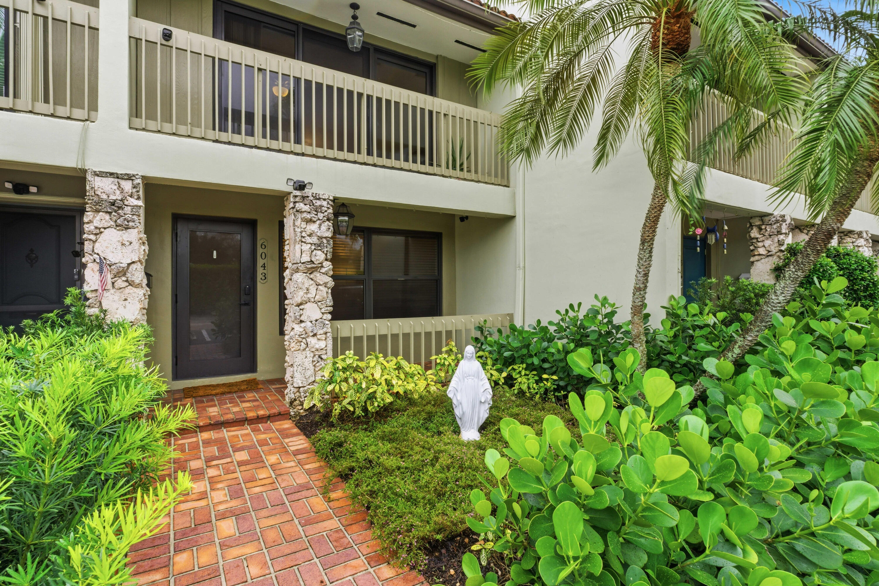 Beautifully updated townhome in the desirable Bay Colony community. This residence features 2 spacious on suite bedrooms, 2.5 baths, and a private courtyard ideal for outdoor enjoyment. The updated kitchen includes maple cabinetry, granite countertops, sandstone backsplash and newer appliances. Additional upgrades include a tankless water heater, high impact windows and sliding doors. Washer & dryer in first floor. The home offers two assigned parking spaces. Community amenities include a clubhouse, heated pool, bike room, and assigned storage. The building has a brand-new roof recently installed in 2025. Conveniently located within walking distance to shops and restaurants, with the beach just a short drive away. HOA monthly fee $341 include: Landscaping, Maintenance, Water, Sewer, Trash removal, basic cable tv.