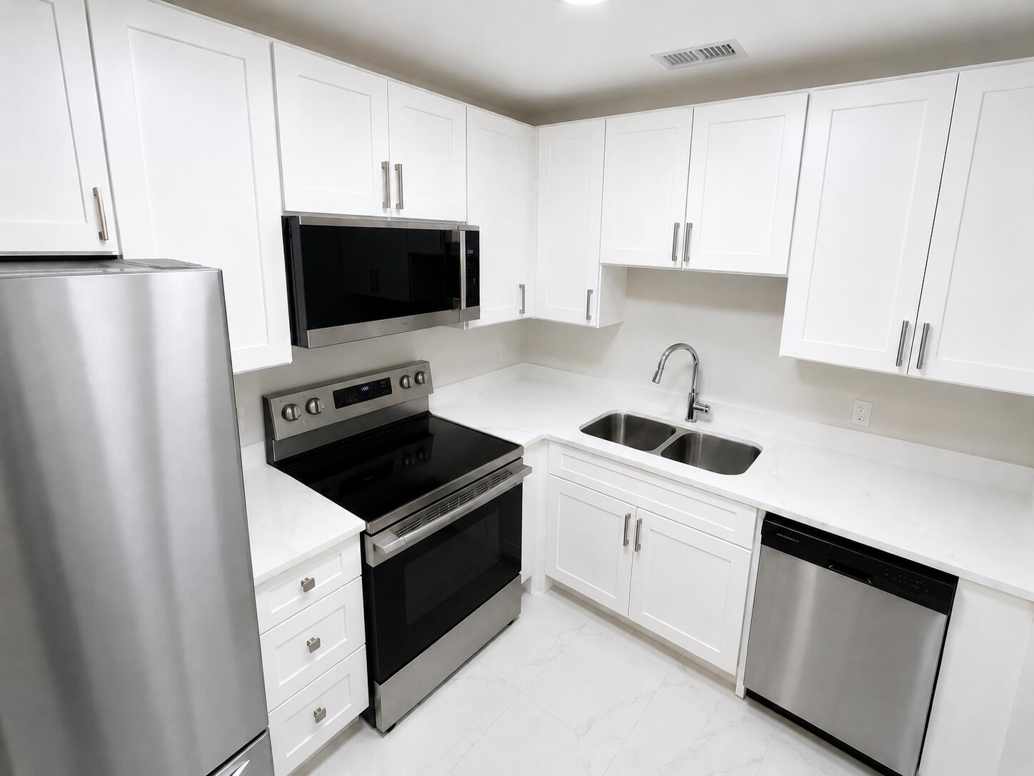Welcome home to this charming one-bedroom, one-and-a-half-bath condominium located in Vista St Lucie. This first floor 55+ condo is completely renovated featuring brand new impact windows, new kitchen, new tile floor, new bathroom with walk in shower, and much more! Boasting 800 sq ft under air, providing comfortable living space while being easy to maintain. The thoughtful layout maximizes functionality with in unit washer dryer and enclosed back porch. Whether you're seeking a new place to call home or an investment property, this condo delivers practical appeal and solid value. Monthly Maintenance includes cable, water, trash, landscaping, building insurance, amenities, on site management and more. Roof was done earlier this year! This truly is the definition of a turn key deal!