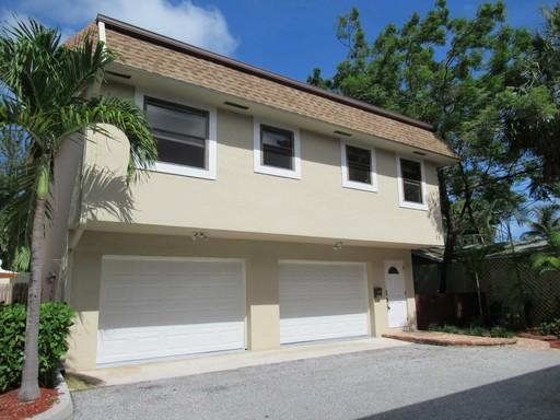 Take advantage of renting a spectacular eclectic 2 bedroom / 1 bathroom apartment with a 1 car garage in the Historic Flamingo Park. Right across from the Armory Art's Center, Howard Park (with Dog Park, Baseball, Basketball, Play Tennis, Playground, BBQ areas and more), and just a short walk/bike/car ride away from PB Warehouse District, City Place, Palm Beach Convention Center, Hilton Hotel, Antique Row and the Downtown Arts/Entertainment District (Clematis Street & Downtown Waterfront). ALSO, just a hop, skip and a jump from the beautiful Palm Beach Island, and just a short drive away is the Palm Beach Outlets and Whole Foods Market. The location is unbeatable!...Oh by the way, the Palm Beach International Airport is just 5 minutes away!!!   This apartment is fully upgraded with granite countertops, stainless steel appliances, custom mahogany wood bar/pass through, upgraded lighting, and vinyl wood plank flooring throughout. Enjoy meals in a bright dining area and gourmet kitchen with tile flooring, with a bar opening to a huge living room.    But wait, it gets better! Be one of the only apartments in the Flamingo Park/Downtown area with a huge attached 1 car garage with washer/dryer, and a beautiful brand new gated side yard with artificial turf and paver patio!