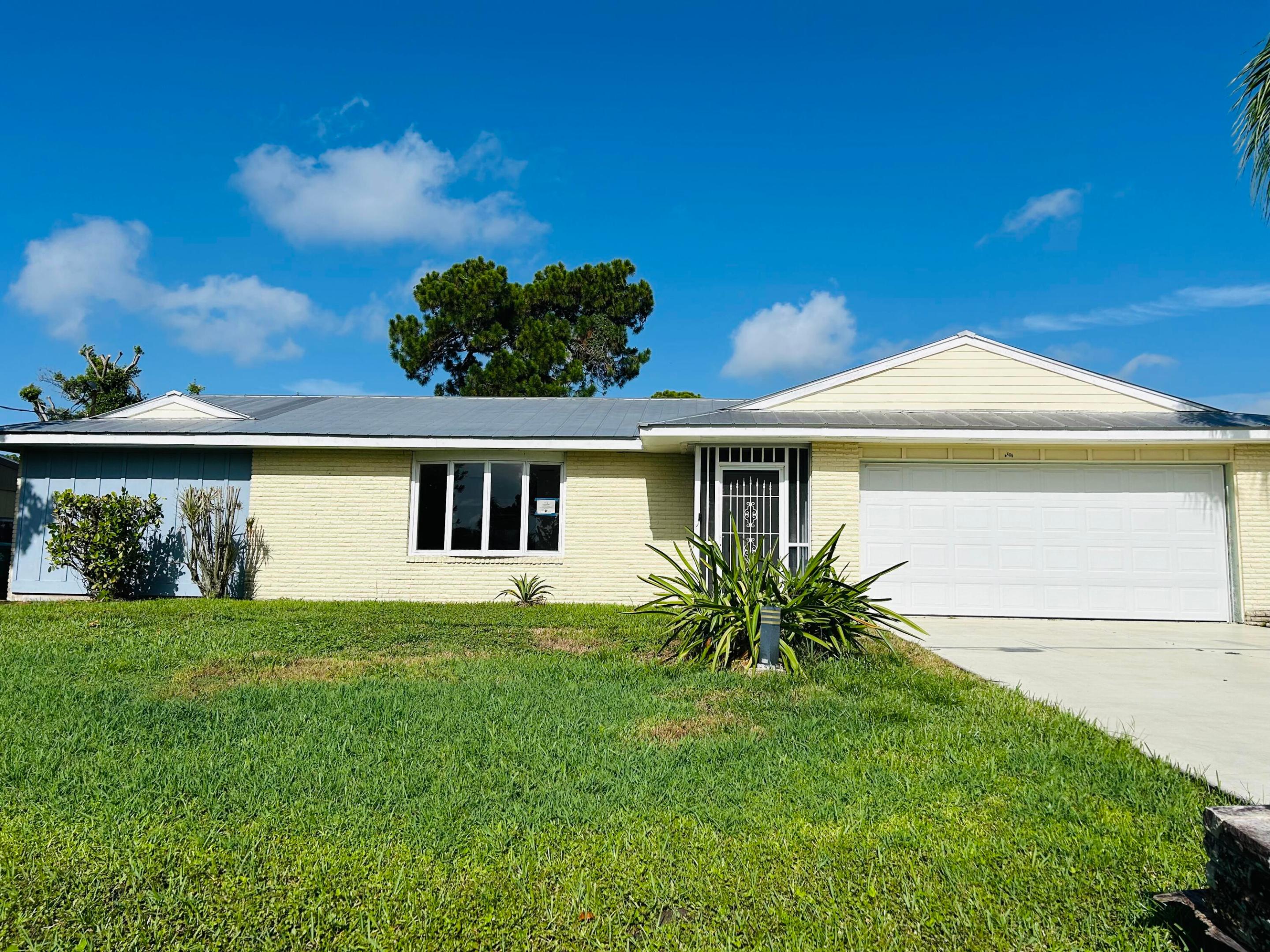 Discover this 3-bedroom, 2 bath split-plan property with an attached 2 car garage, offering separate living and family rooms for everyday flexibility. Tile flooring flows throughout the entire home for a clean, low-maintenance feel. The galley-style kitchen is outfitted with white cabinets, granite countertops, a tiled backsplash, and stainless-steel appliances. The master bath has been updated, while the second bath doubles as a cabana bath with direct access to the screened patio.